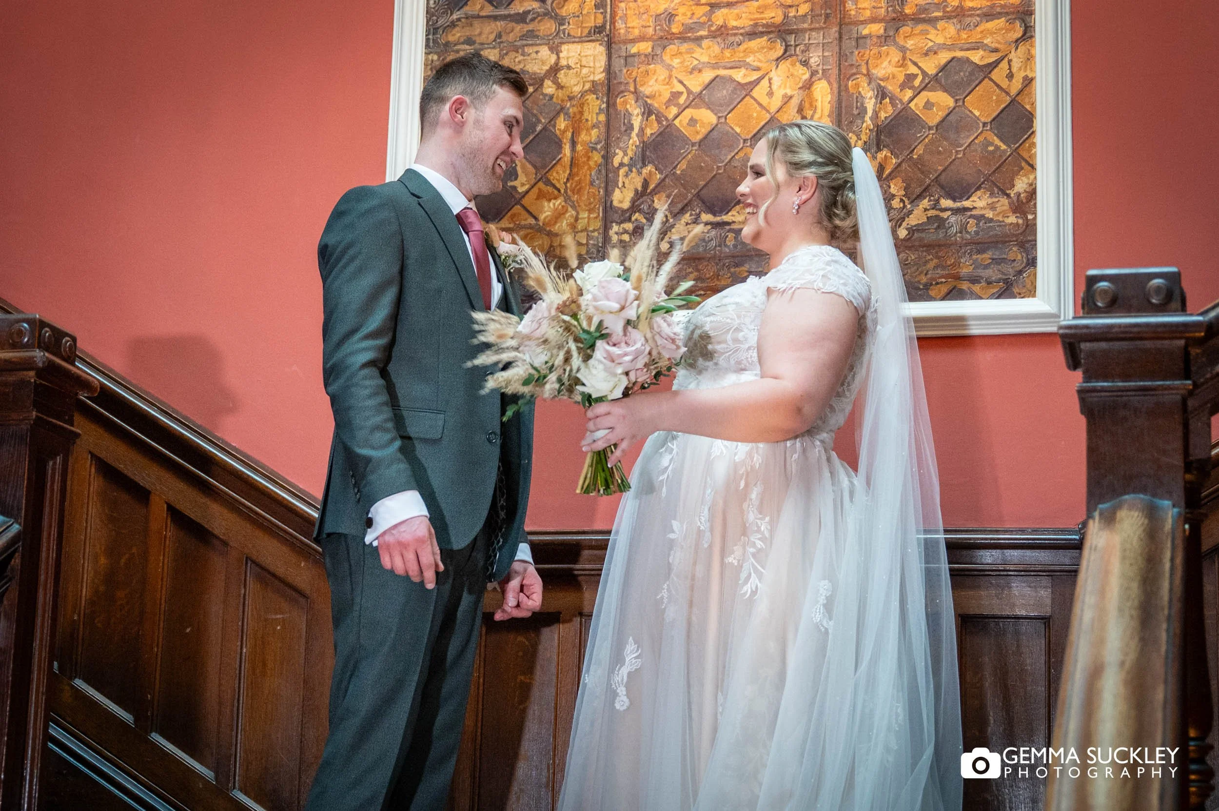 bride and groom first look moment at the falcon manor