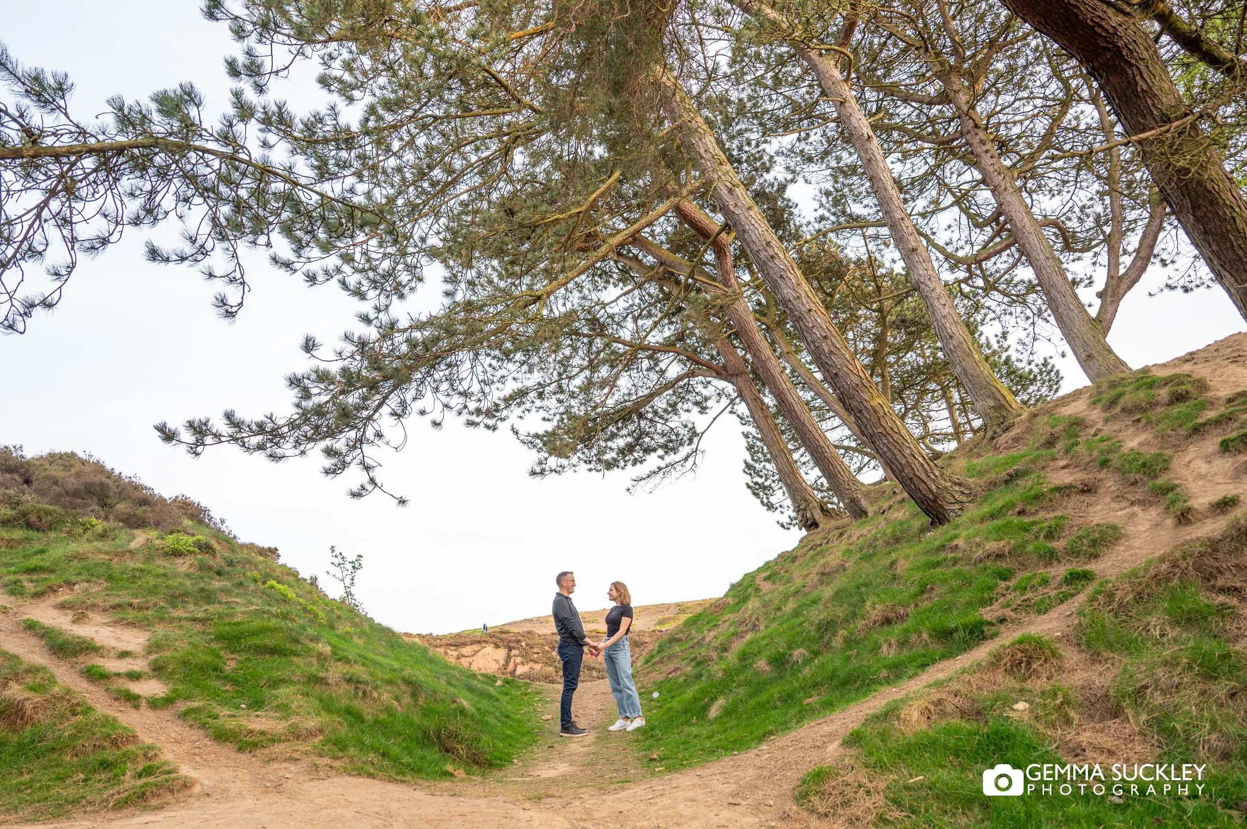Engagement photos on Ilkley Moor with views across the Yorkshire countryside