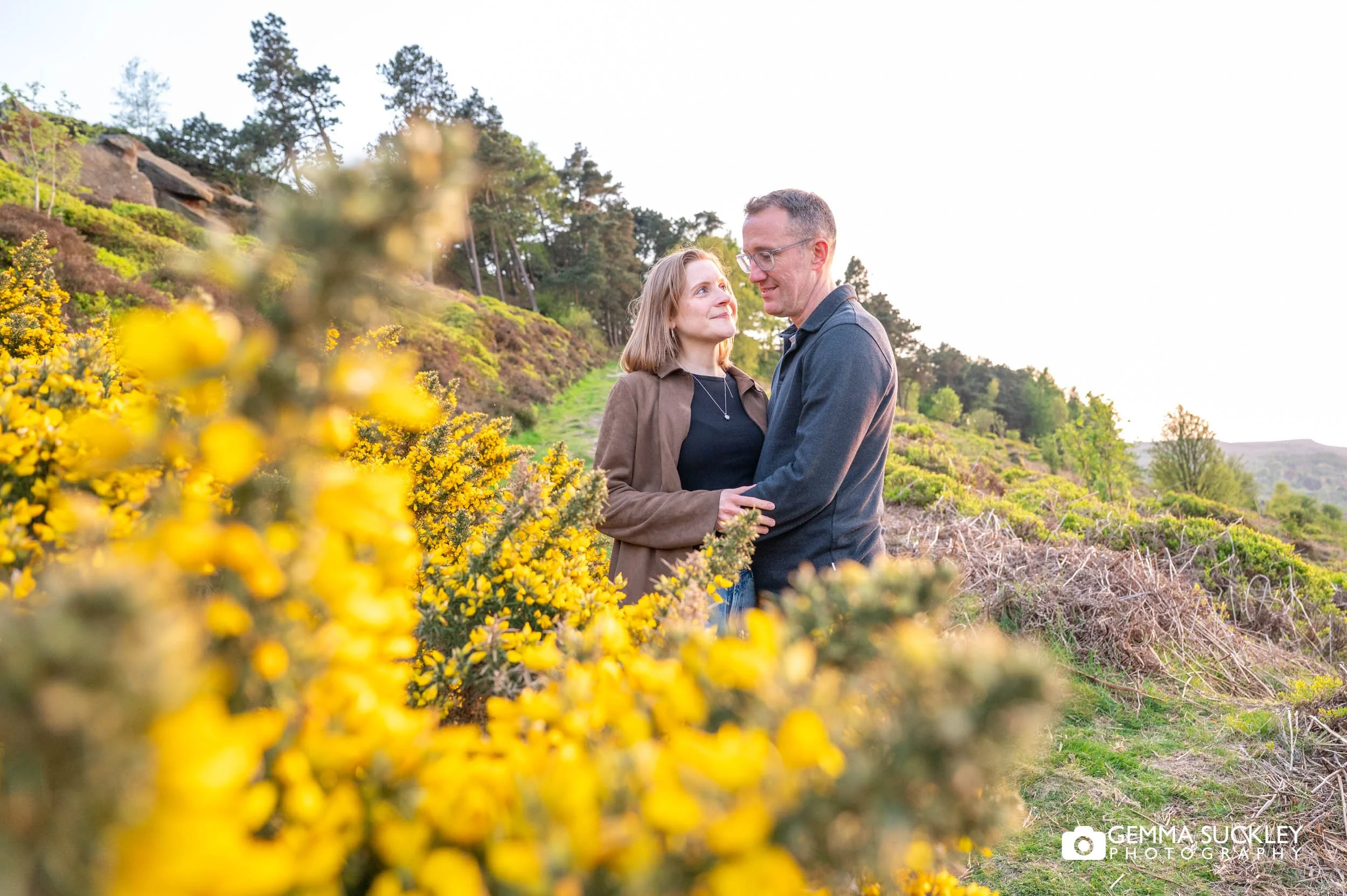 Relaxed engagement photo of couple on Ilkley Moor