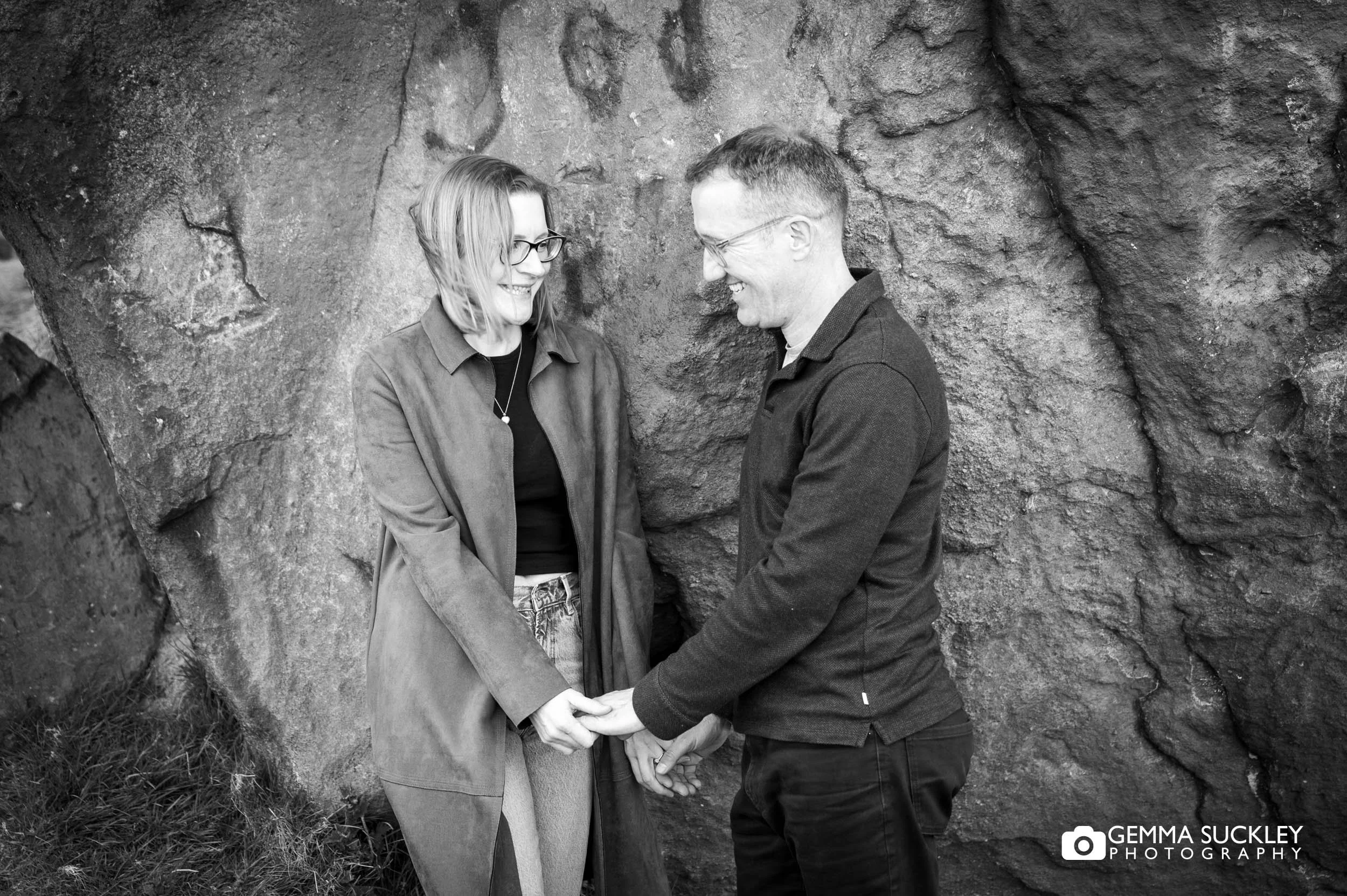 Couple at the cow and calf during their Yorkshire engagement shoot
