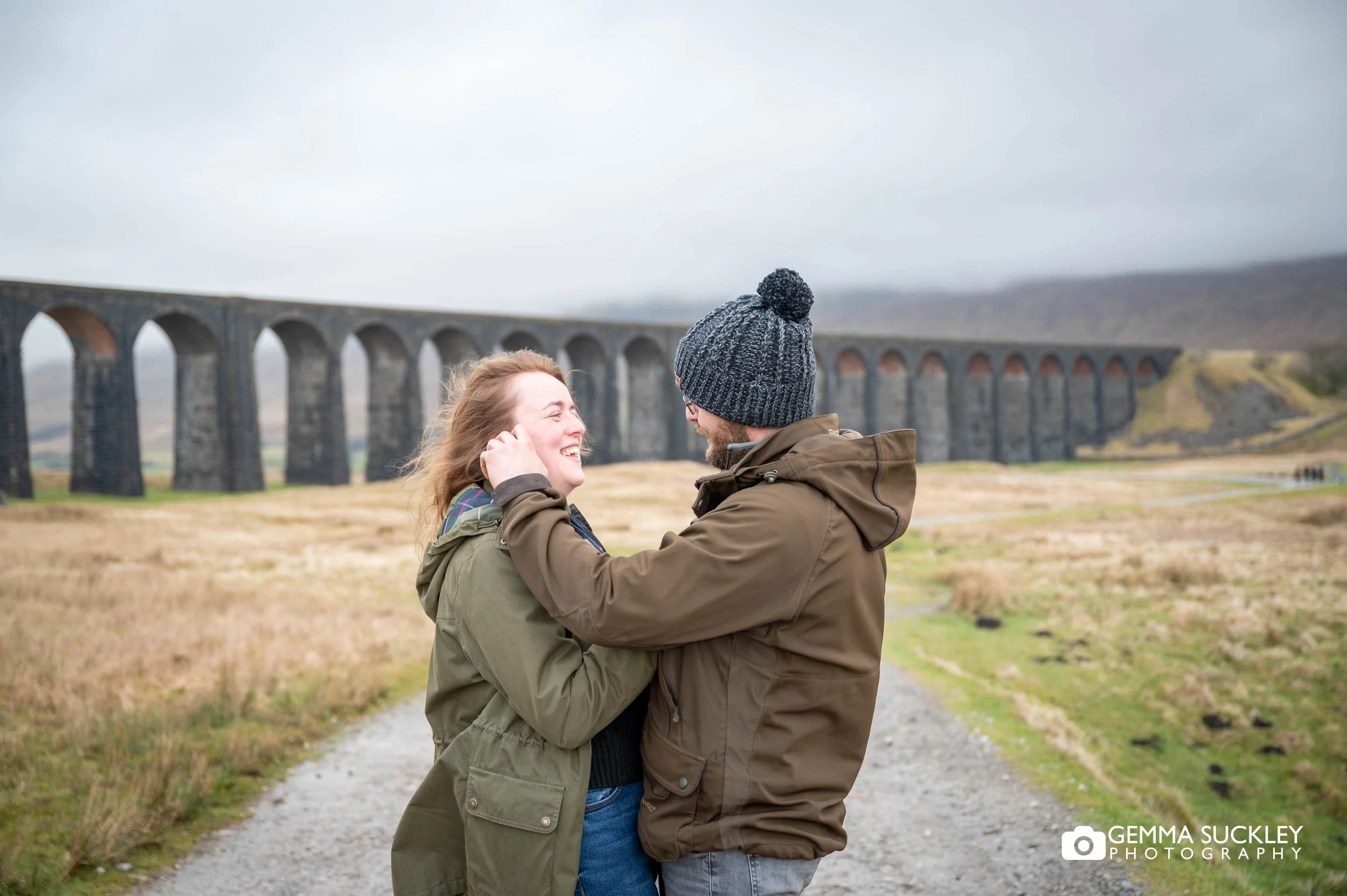 romantic couple portrait ribblehead viaduct yorkshire