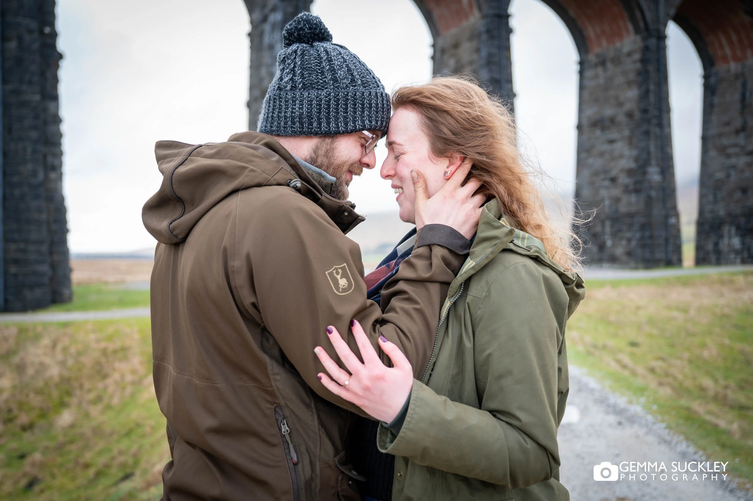 romantic couple portrait ribblehead viaduct in yorkshire