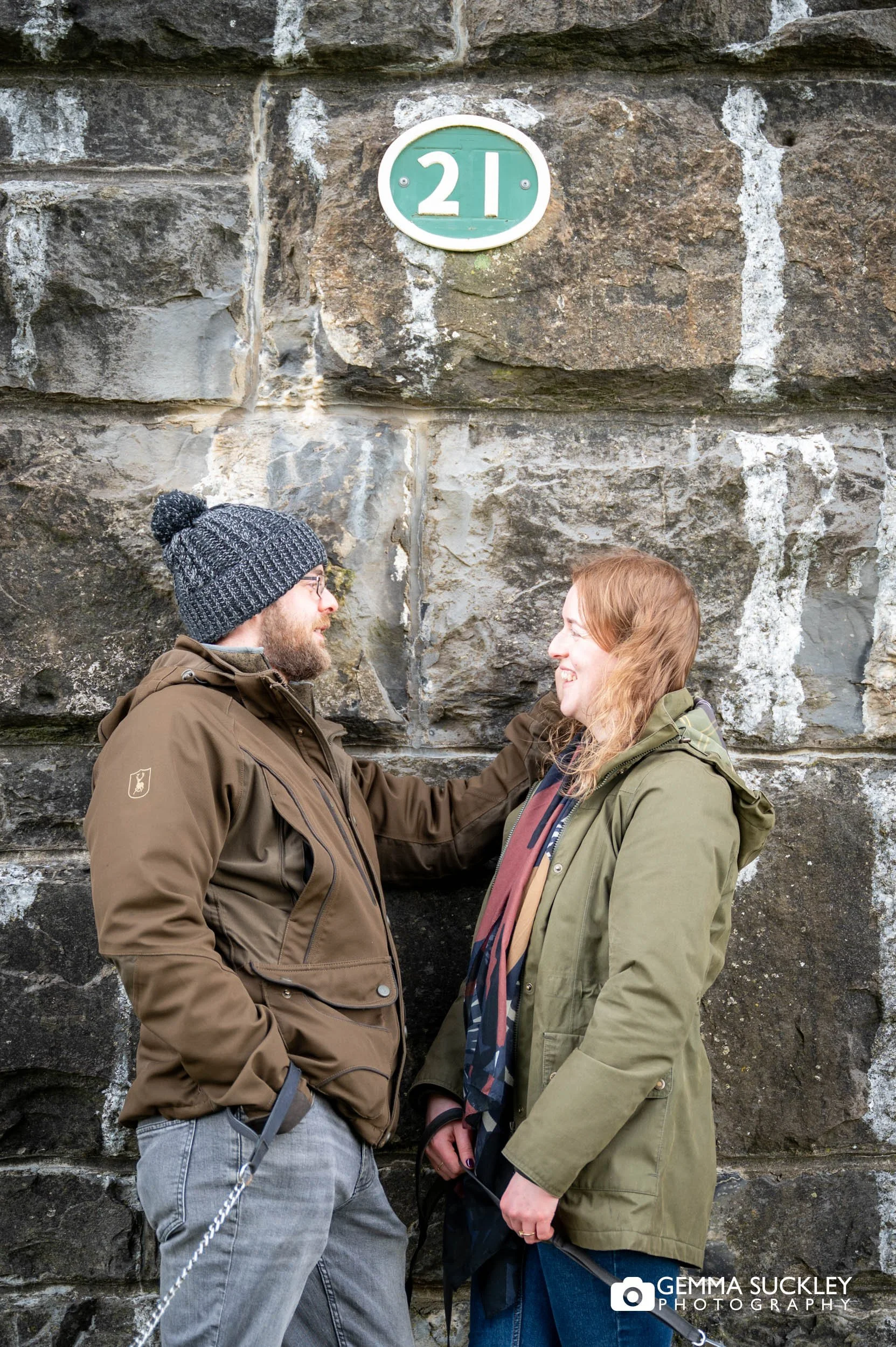 engaged couple under ribblehead viaduct
