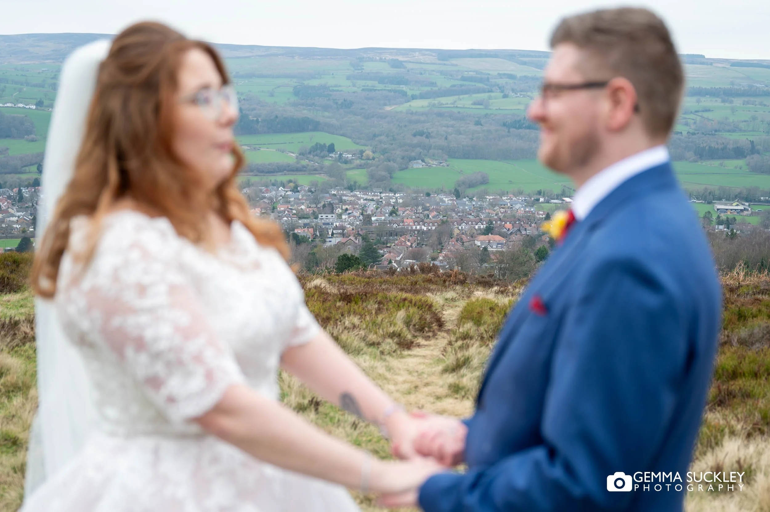 Wedding portraits on Ilkley Moor with dramatic Yorkshire views