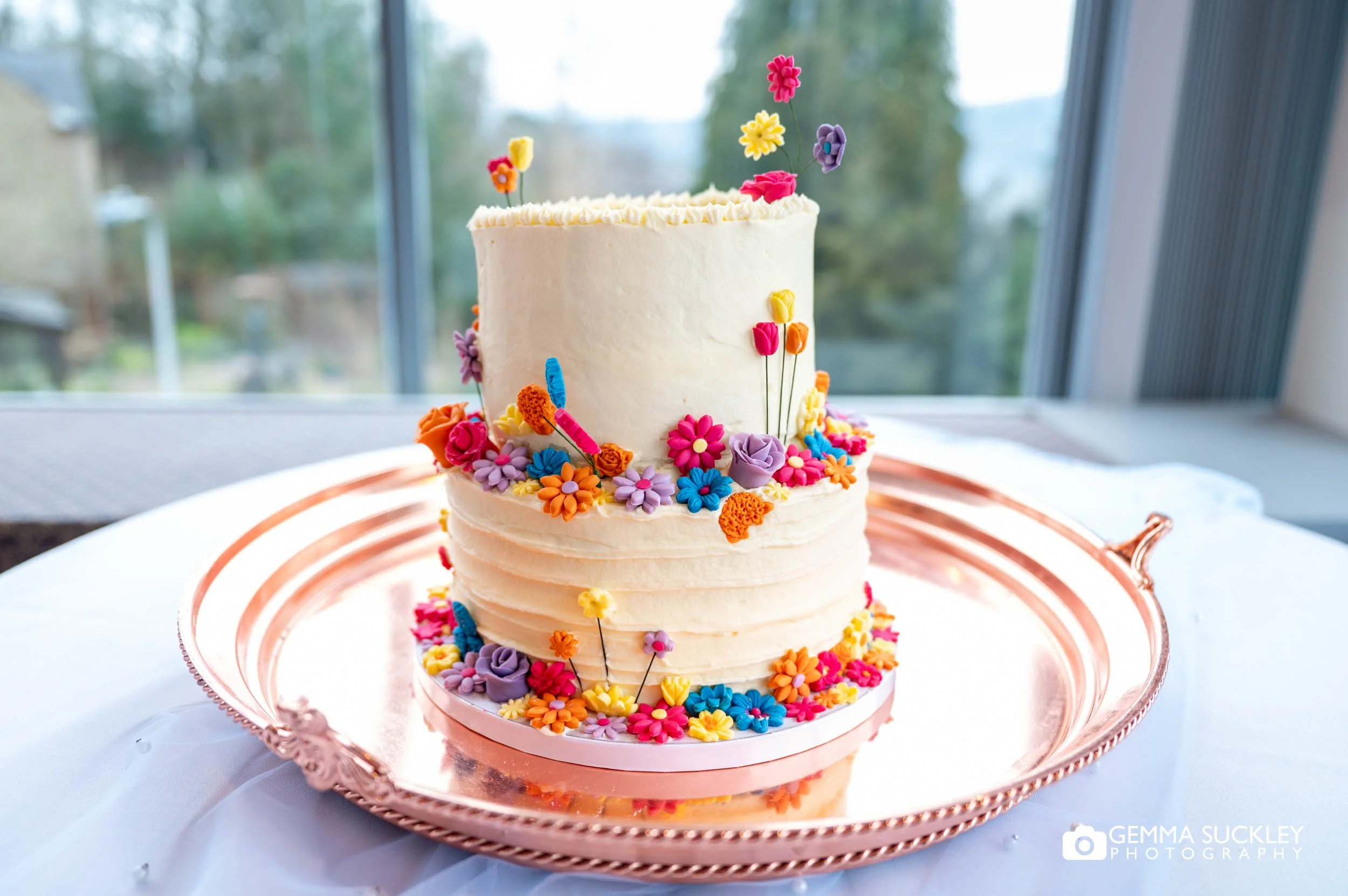 colourful wedding cake at the craiglands hotel in ilkley