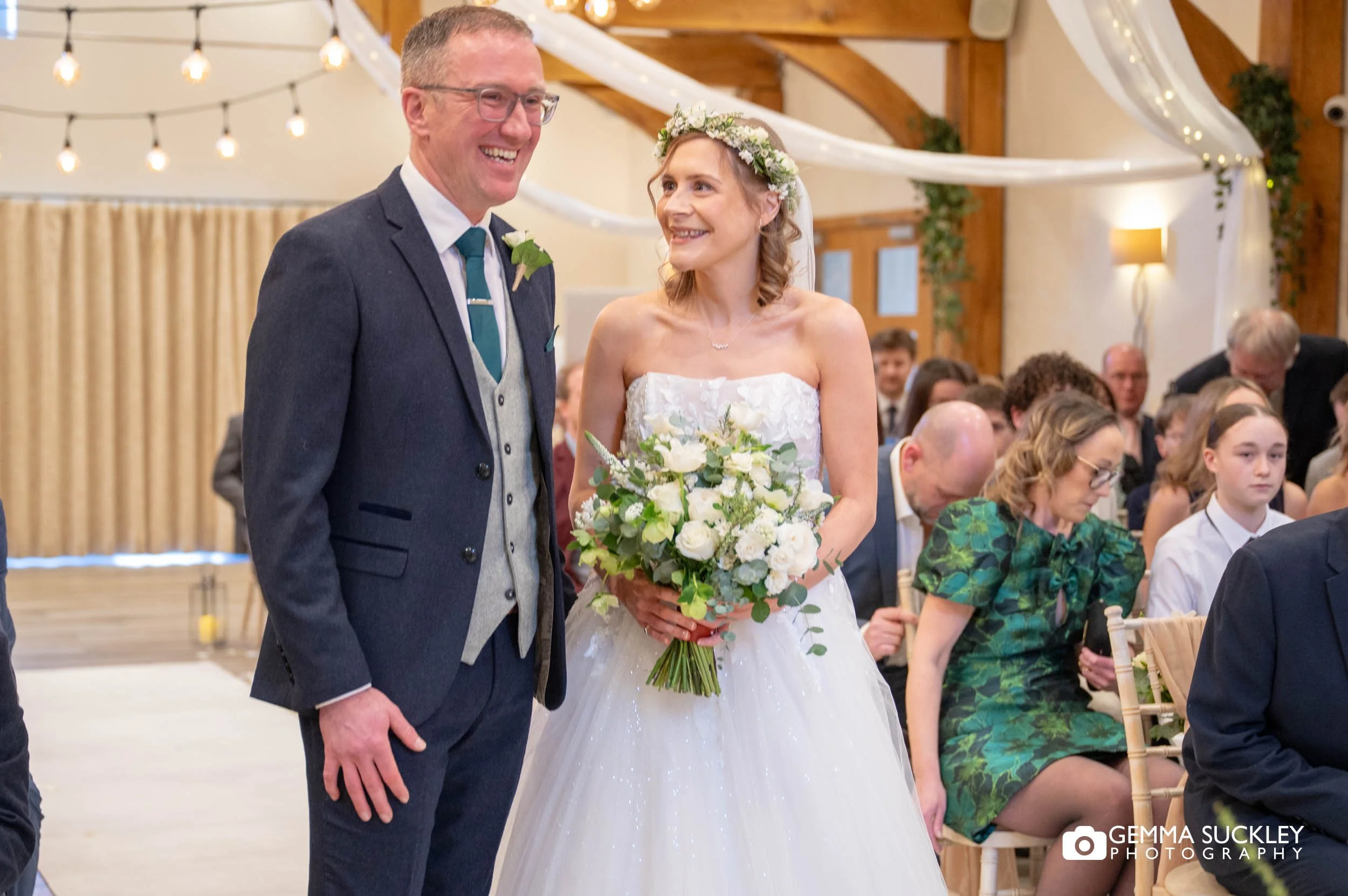 bride walking down the aisle at gamekeeper's inn wedding