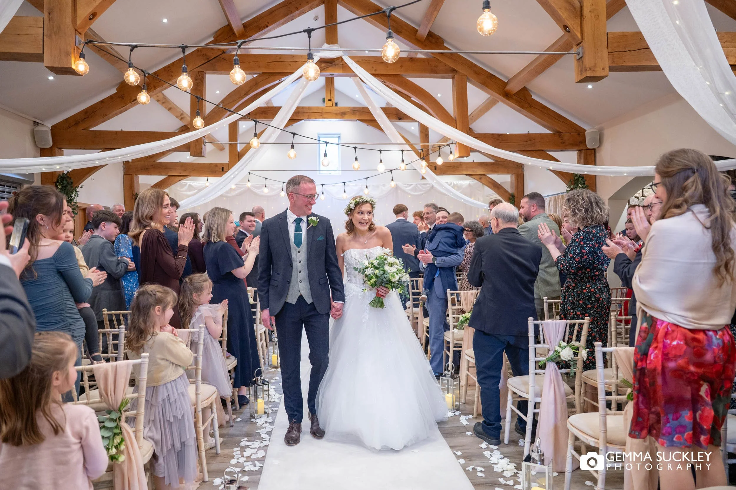 just married couple exiting the gamekeeper's inn