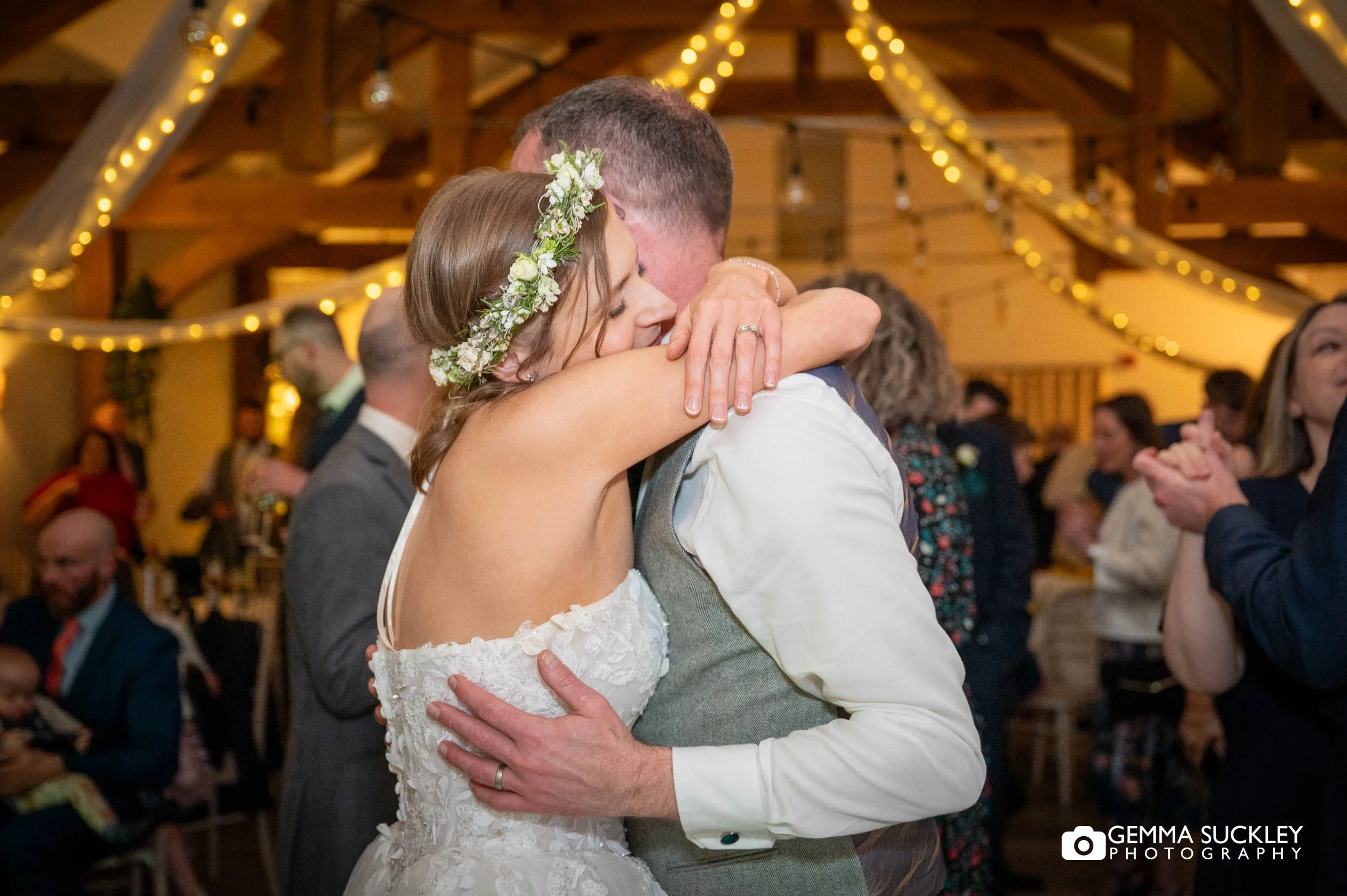Couple celebrating during evening wedding party in the Yorkshire Dales