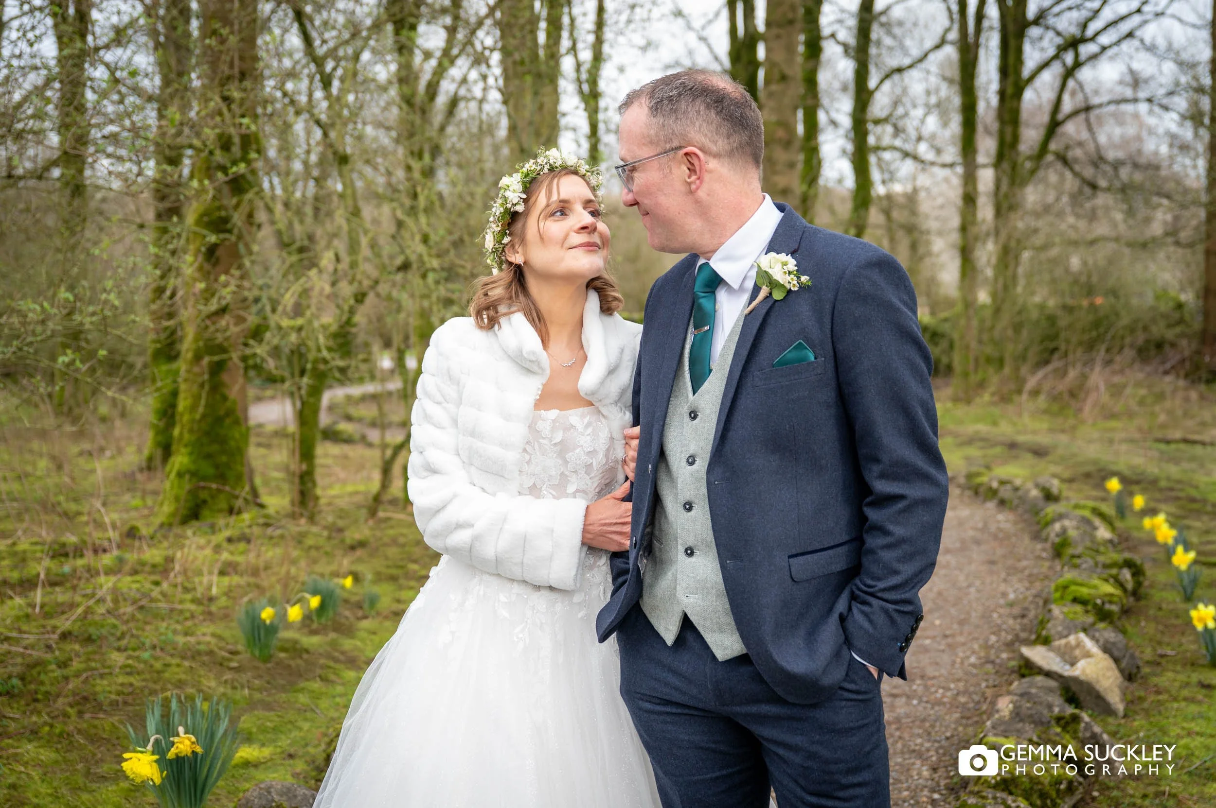 just married couple in the woodland at the gamekeepers inn wedding