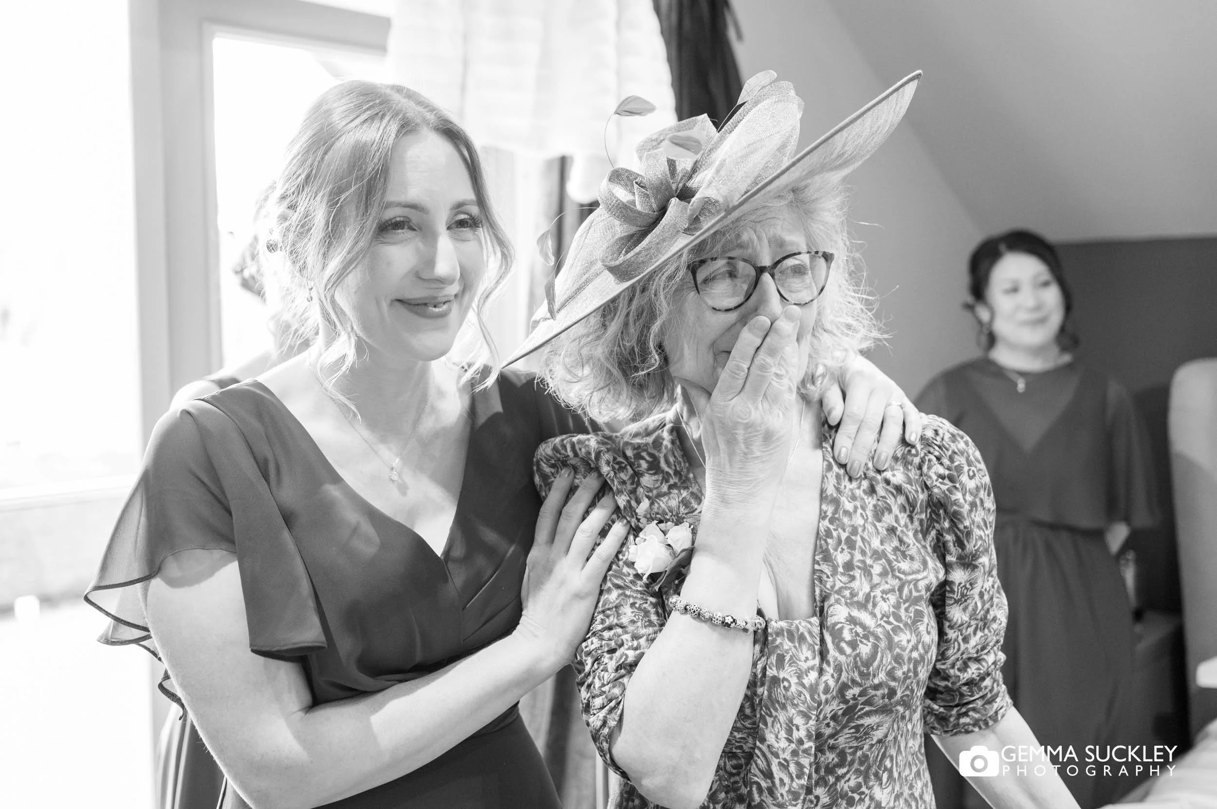 brides family crying after seeing the dress