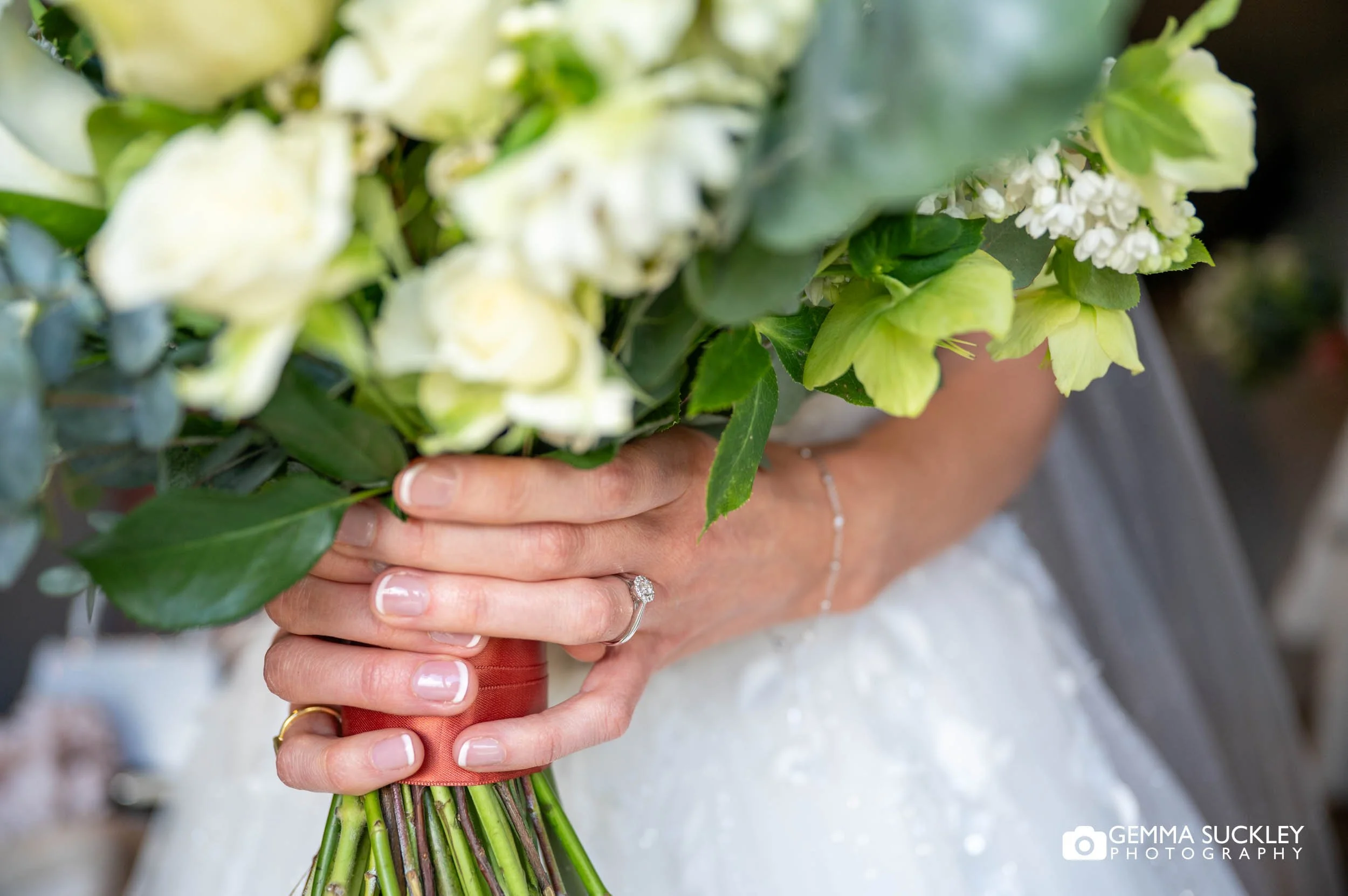 bridal bouquet and engagement ring detail