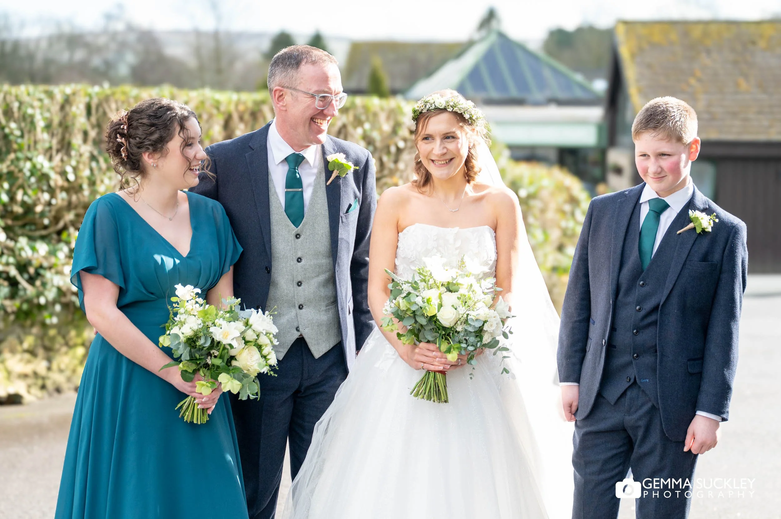 formal wedding photo outside the gamekeepers inn