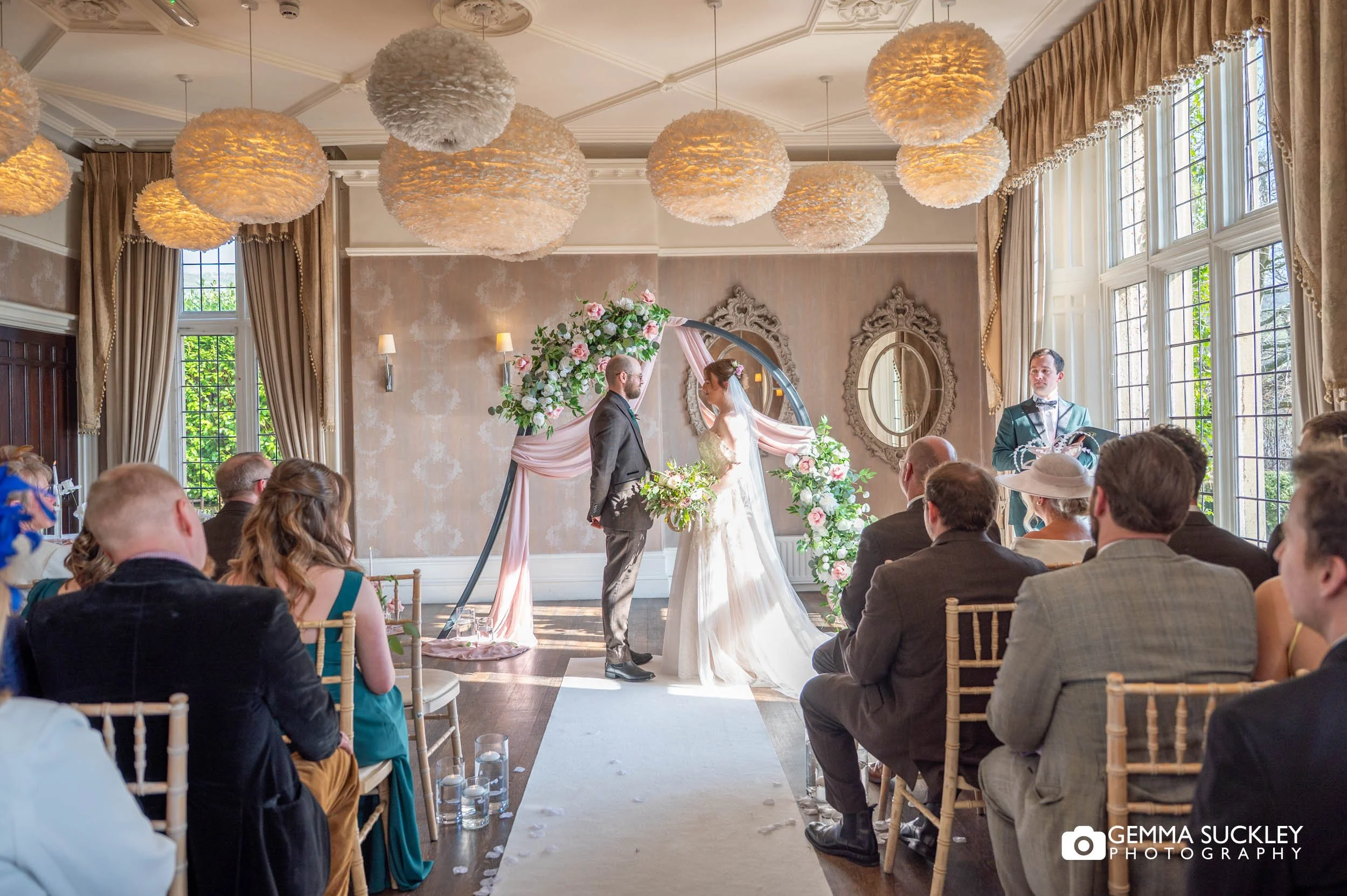 Emotional moment between couple during ceremony at Falcon Manor