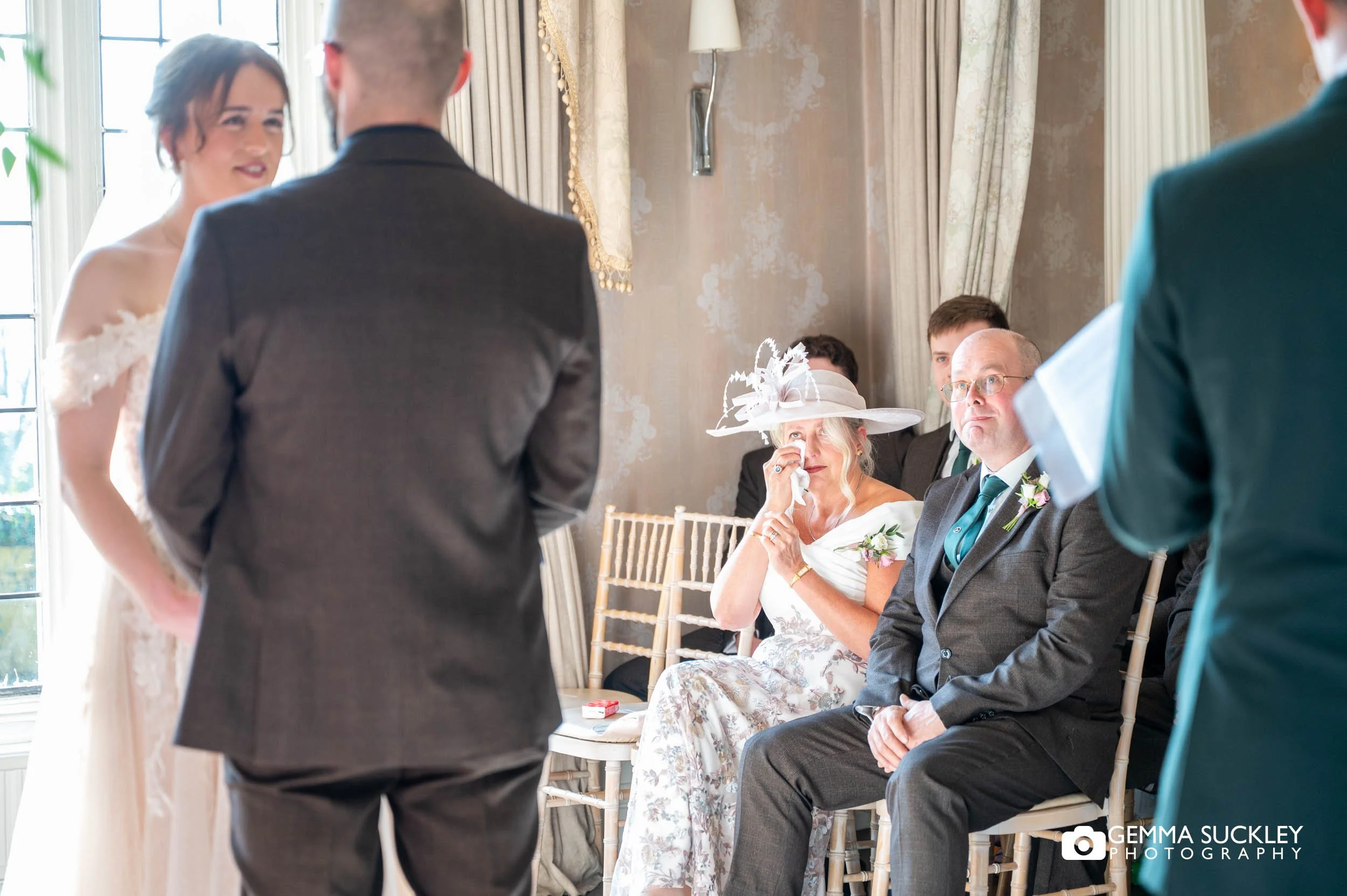 wedding guest crying during the ceremony at the falcon manor