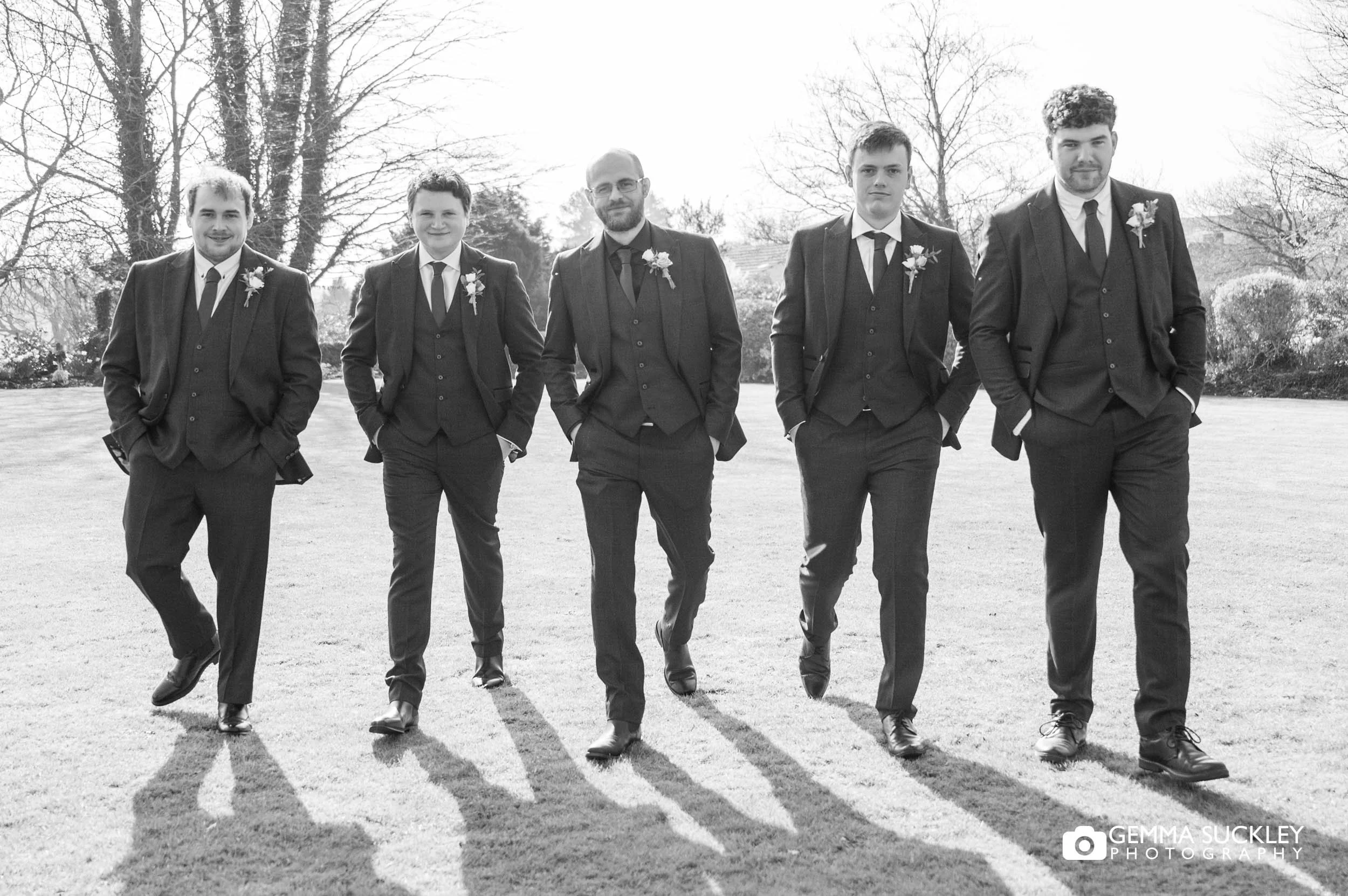 relaxed grooms party portraits at the falcon manor
