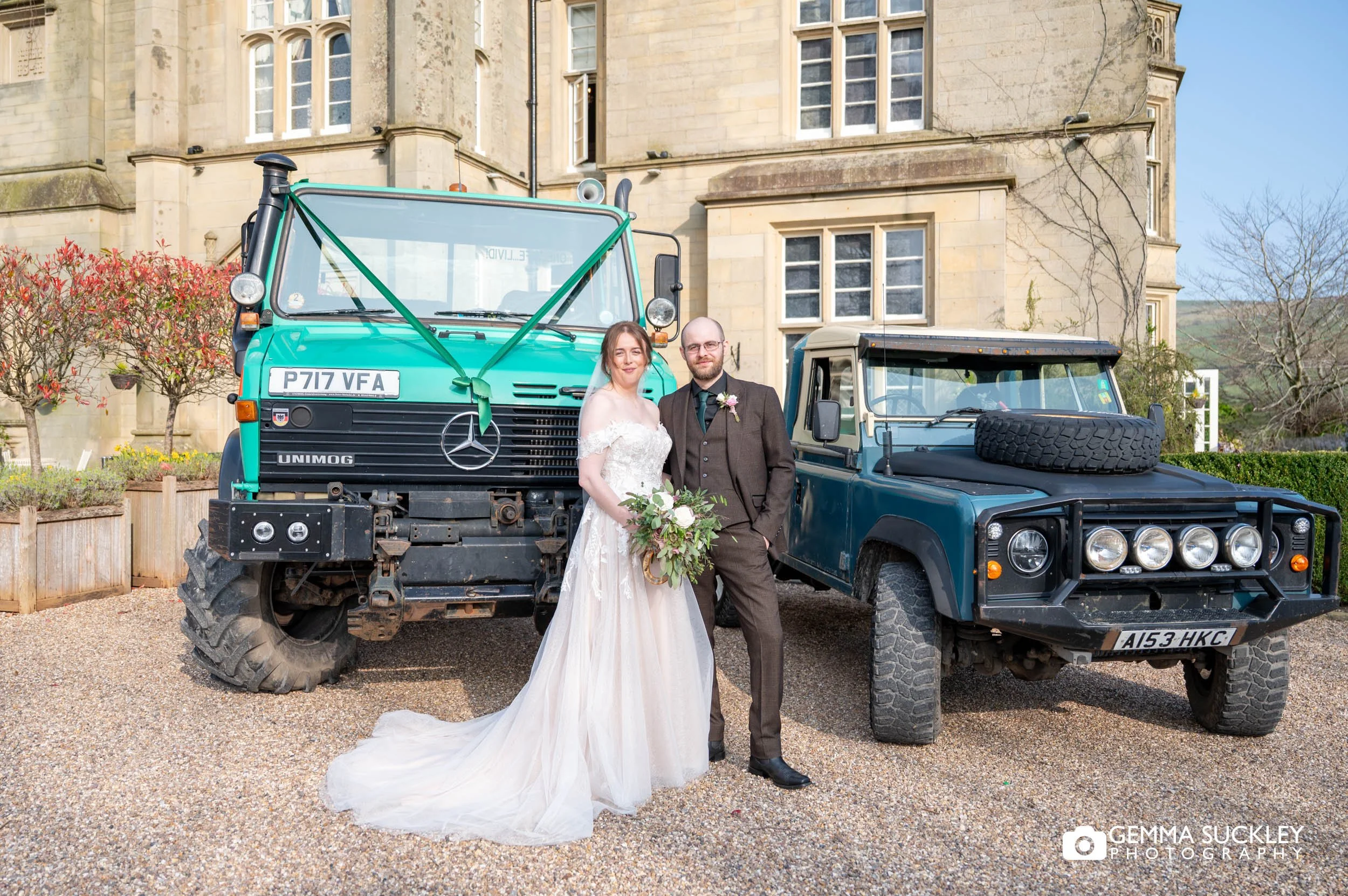 Bride and groom with Unimog at Falcon Manor Settle wedding