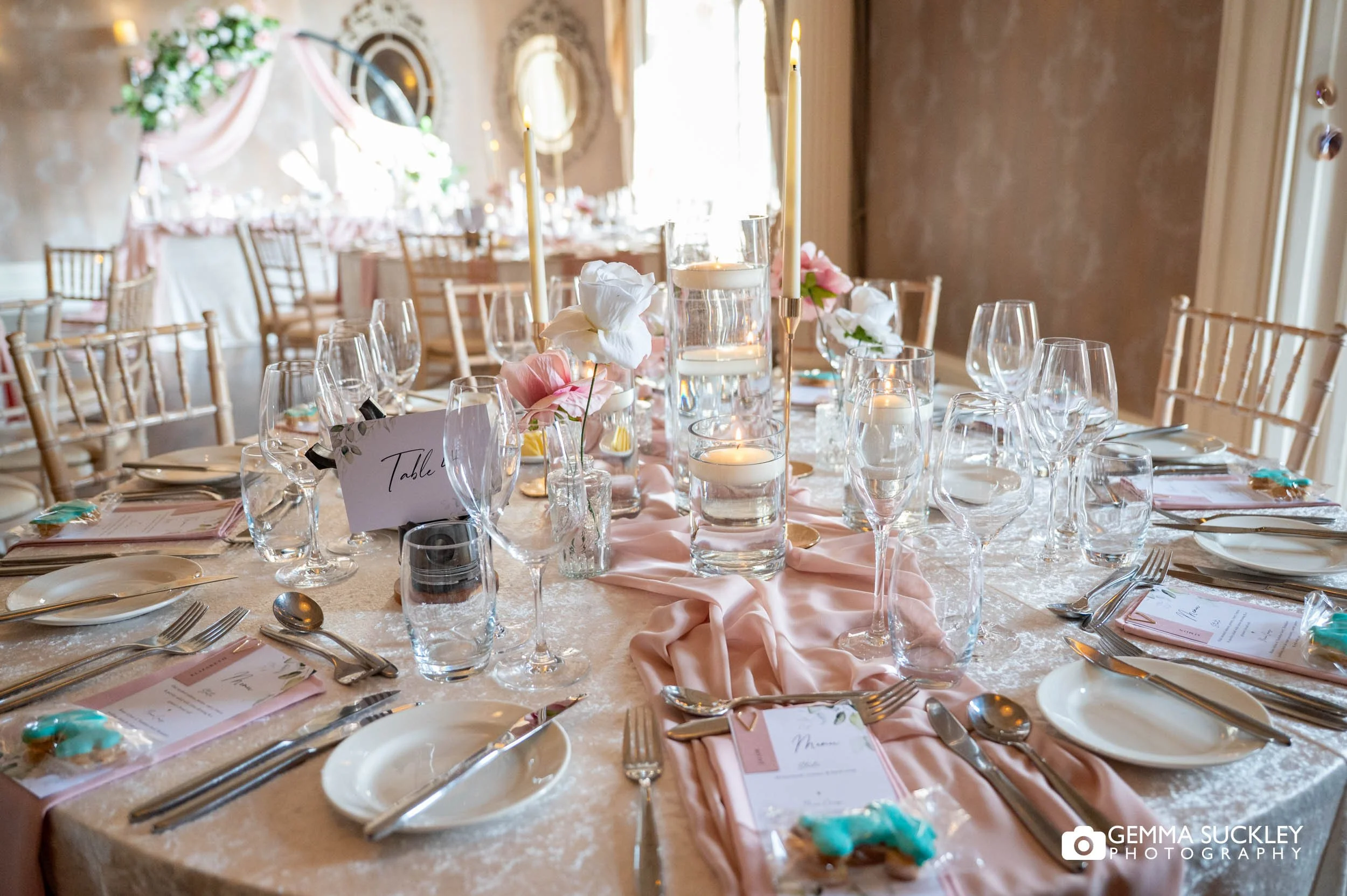 Wedding table with floral centrepieces at Falcon Manor reception