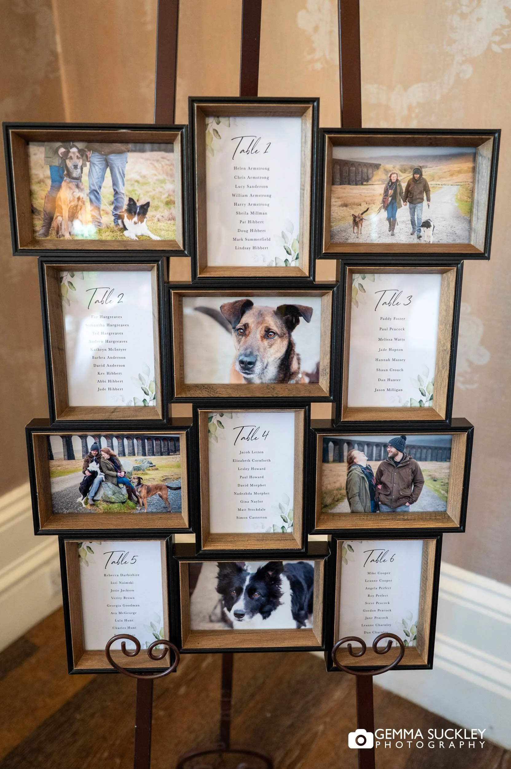 table seat plan with photos of their dogs at the falcon manor wedding