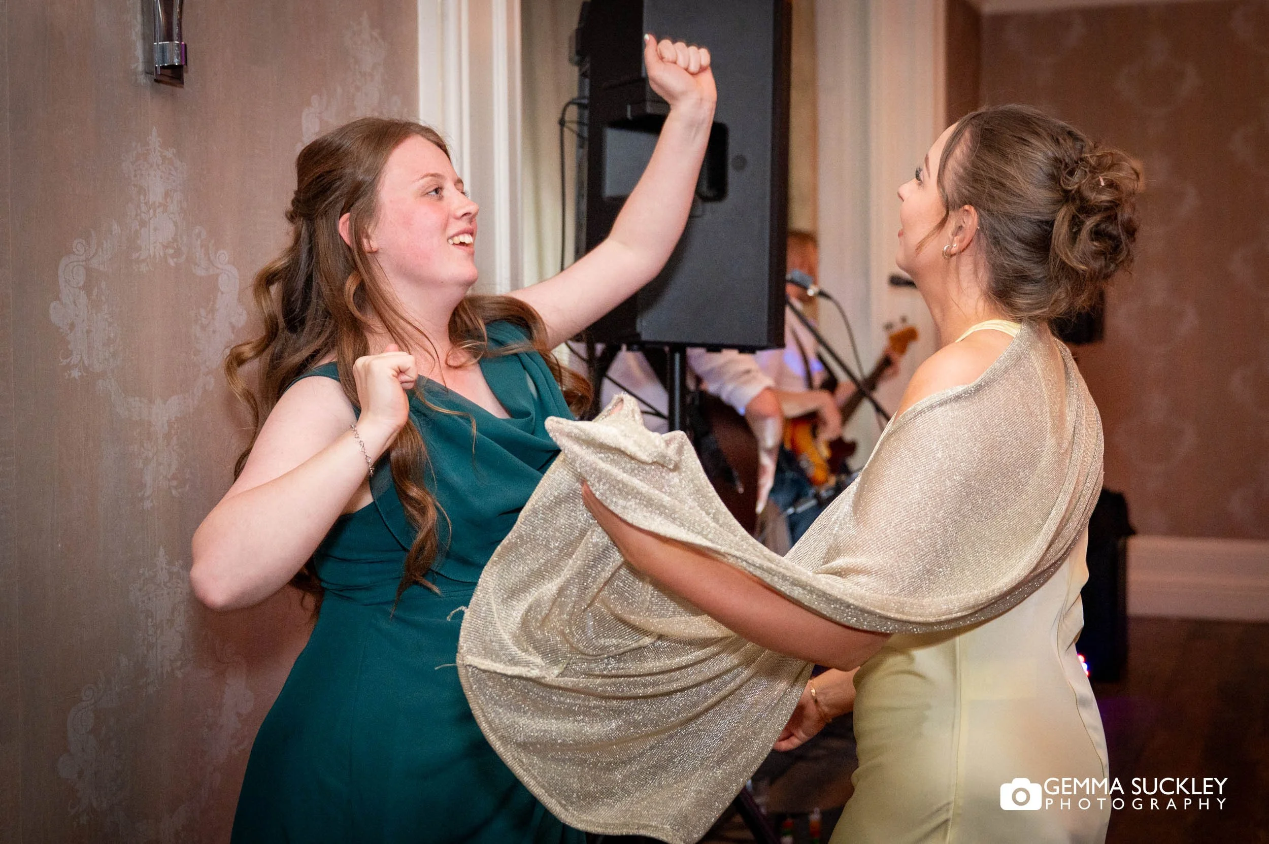 Wedding guests dancing on the dancefloor at Falcon Manor reception