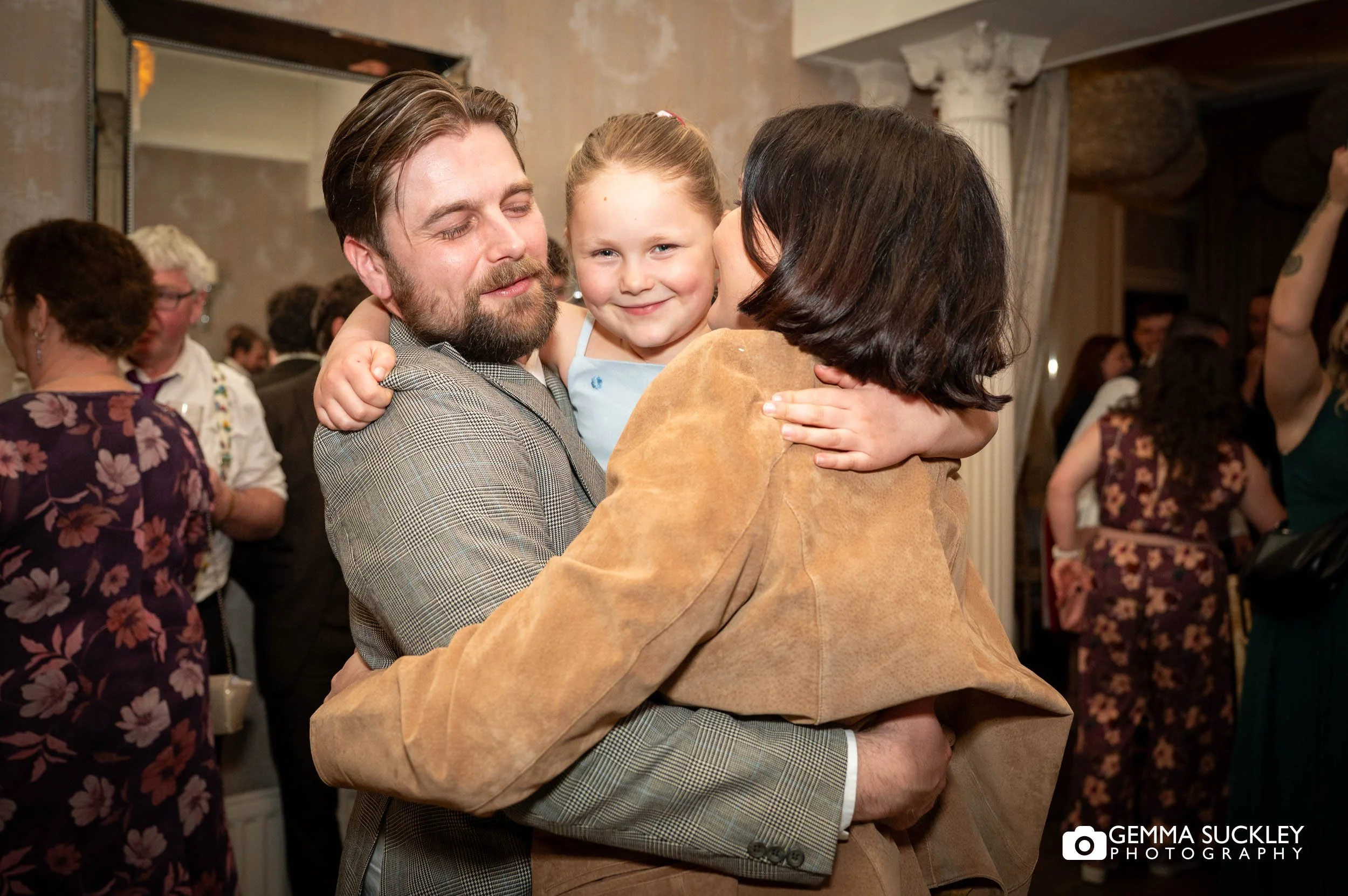 Bride and groom dancing with guests at Falcon Manor Settle