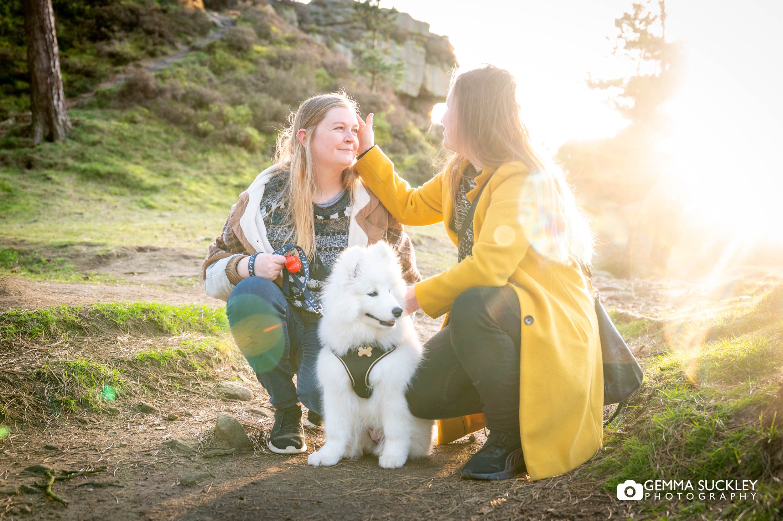 Same-sex couple sharing a moment during their pre-wedding photography session on Ilkley Moor