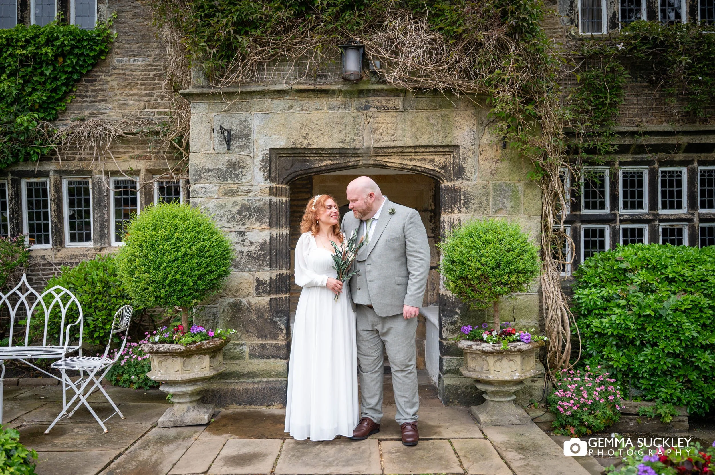 Romantic wedding portraits in the grounds of a historic manor house