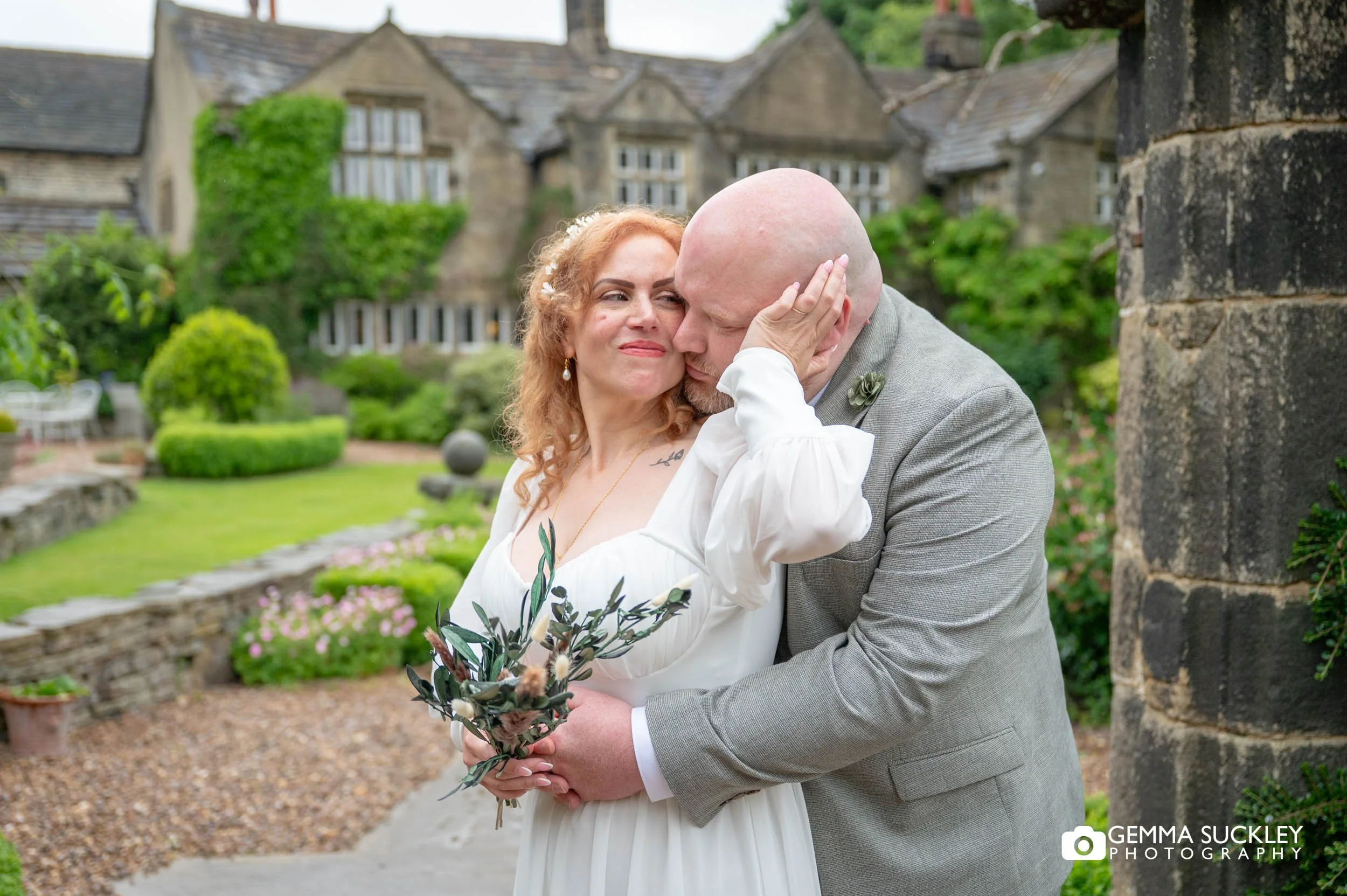 Couple sharing a quiet moment outdoors during their wedding day