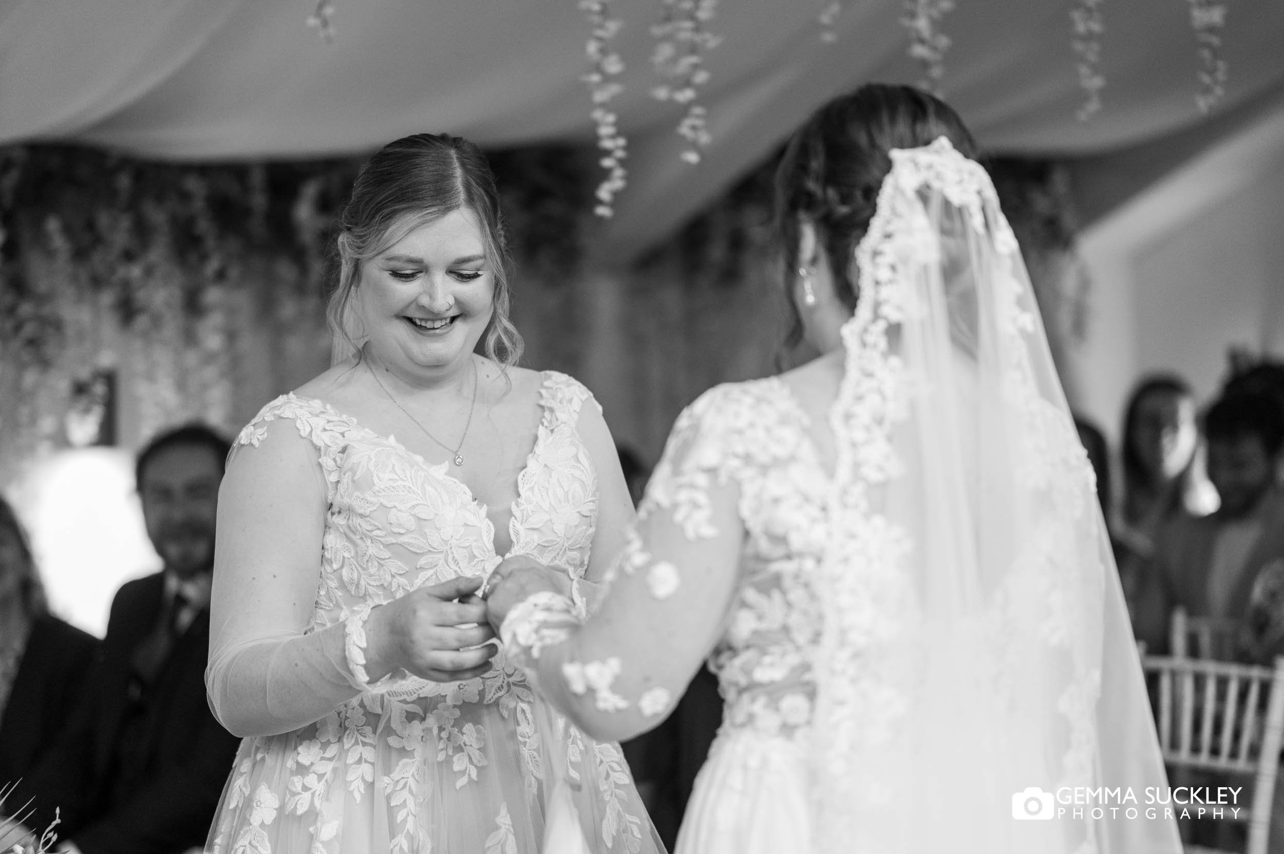Rachel and Dagmara saying their vows in an emotional ceremony