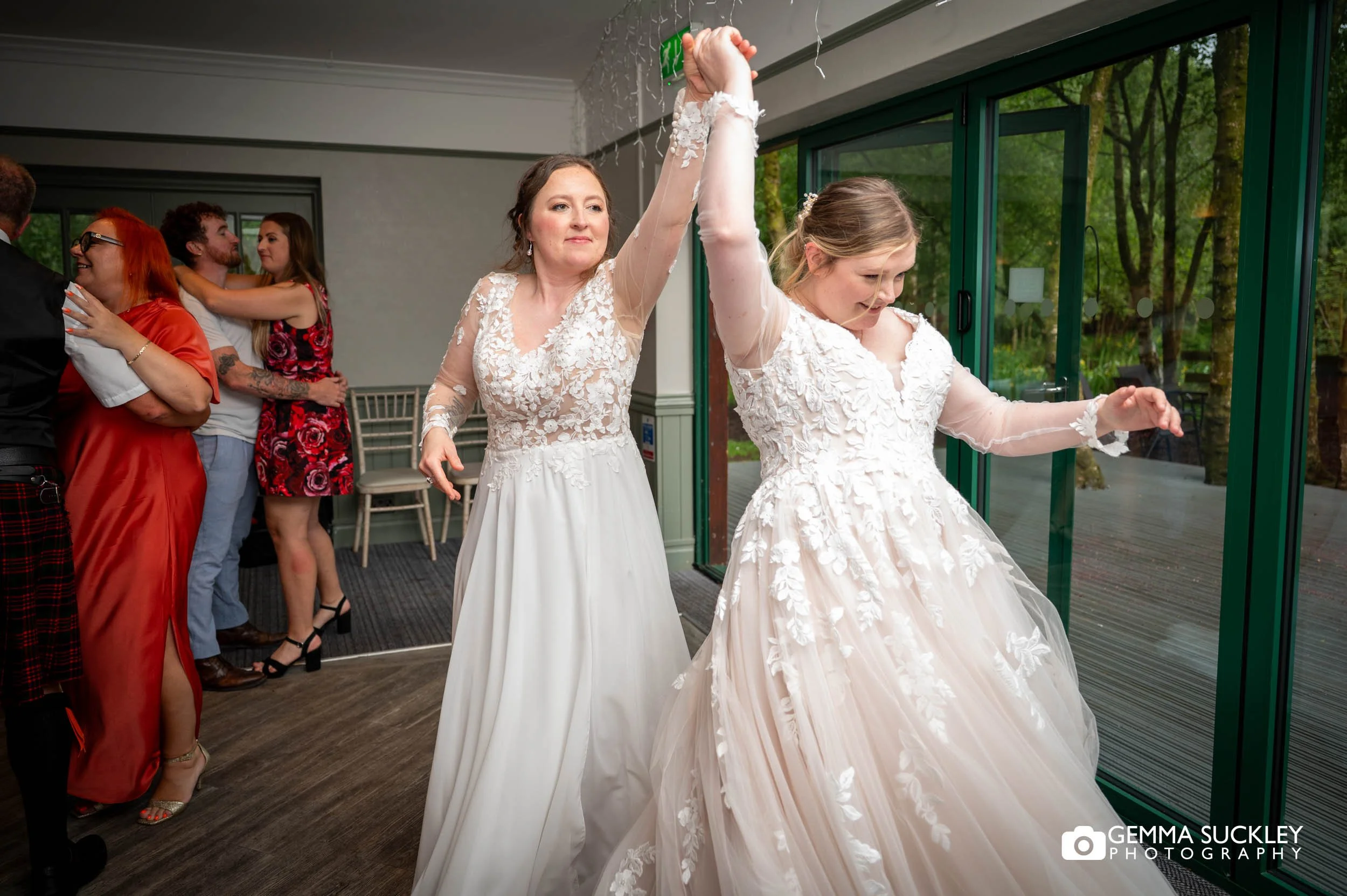 Couple laughing together during first dance