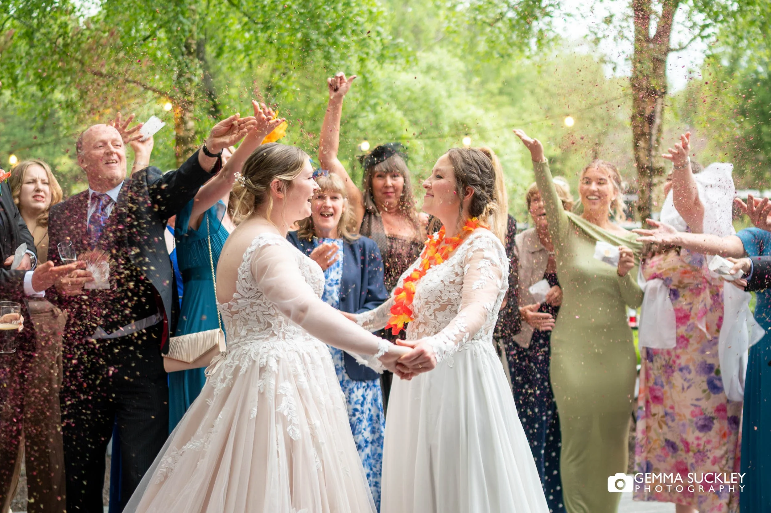 Couple laughing during confetti toss