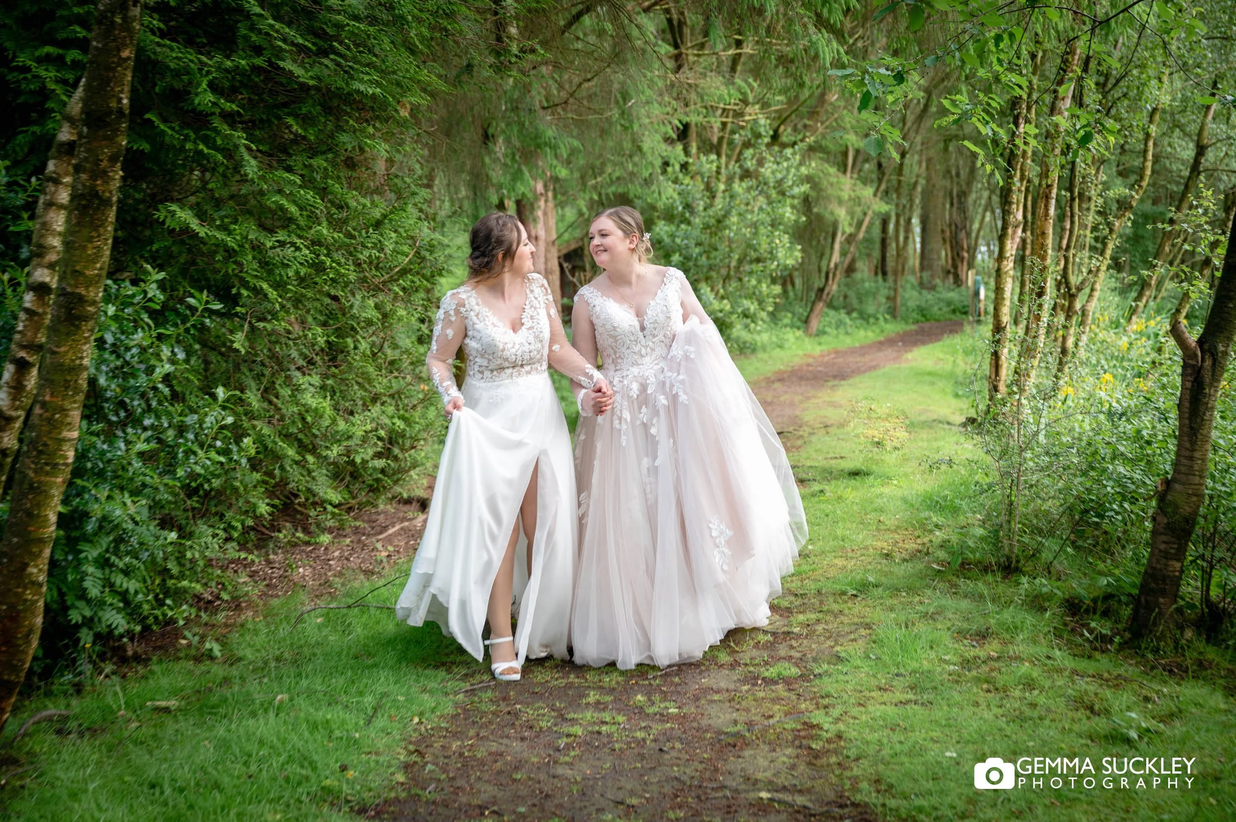 just married couple walking in the woodland