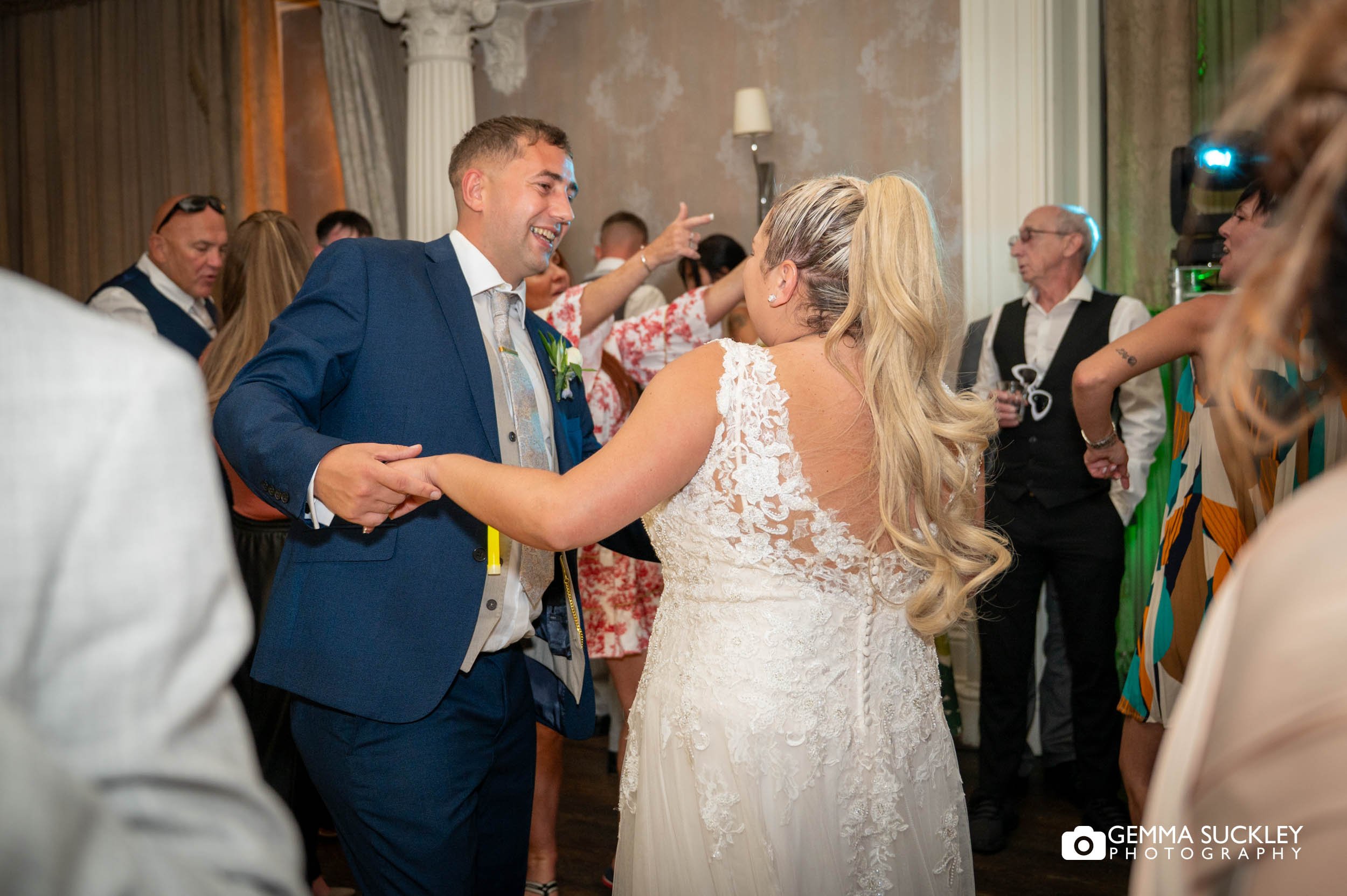 Dance floor full of family and friends