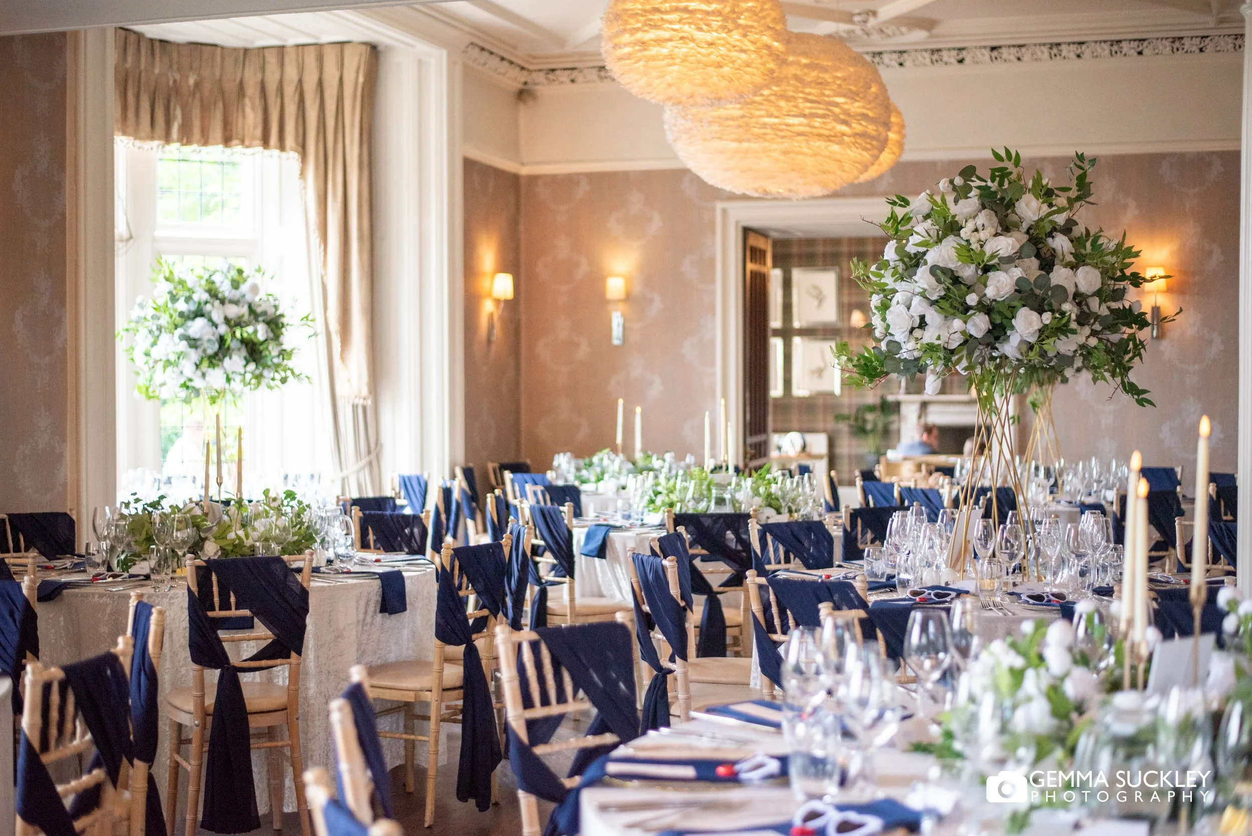 navy and white decorated wedding breakfast room