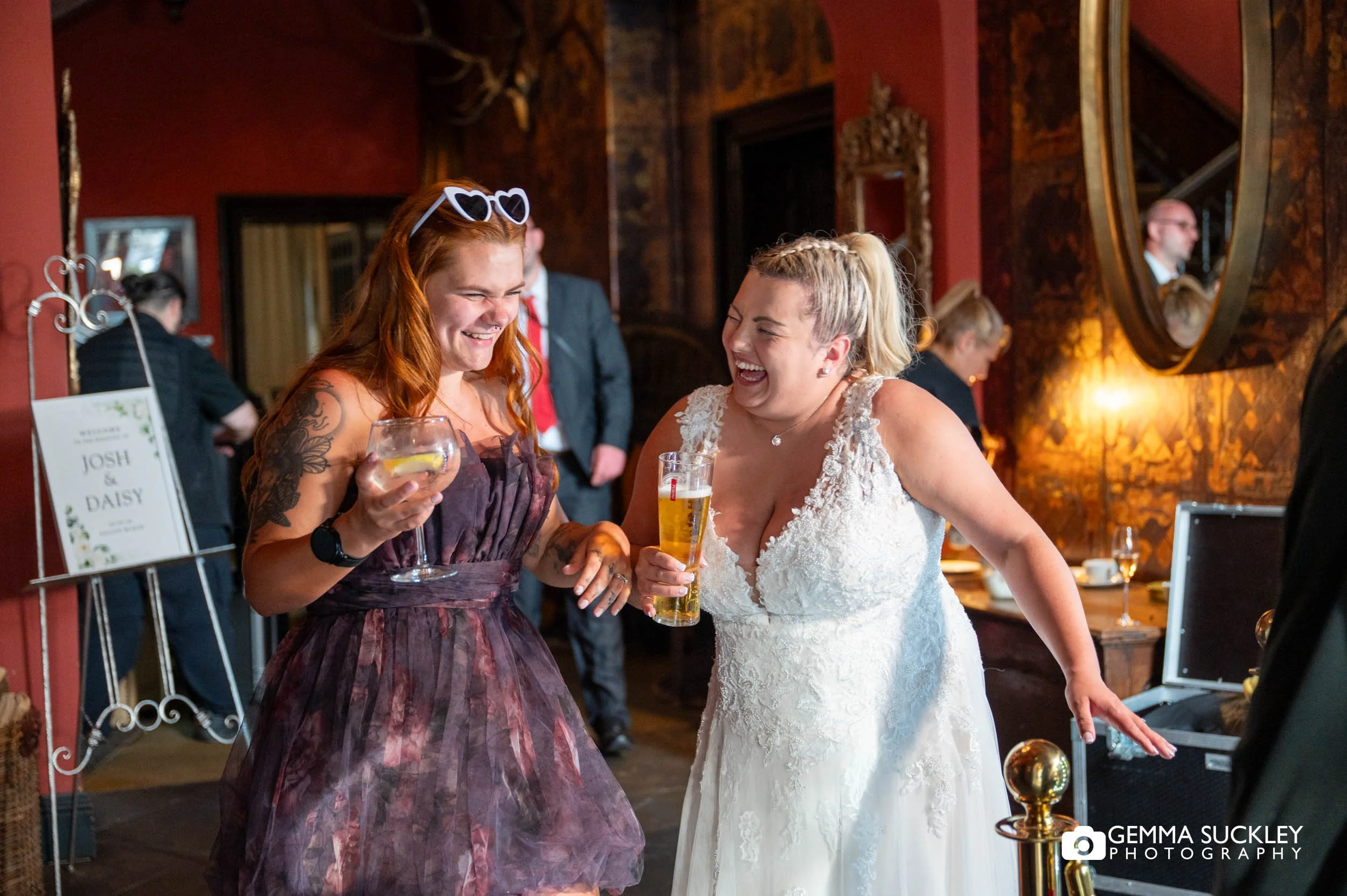 bride and guests lauhging