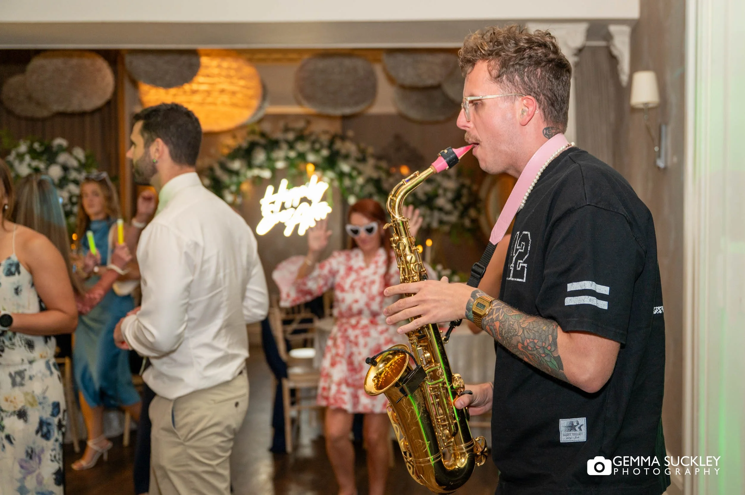 Saxophone player to weding guests