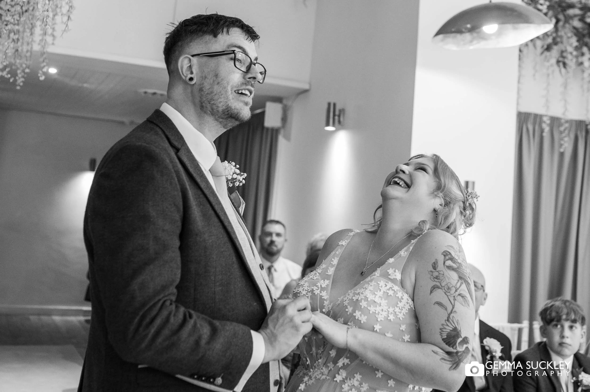 couple laughing during the wedding ceremony