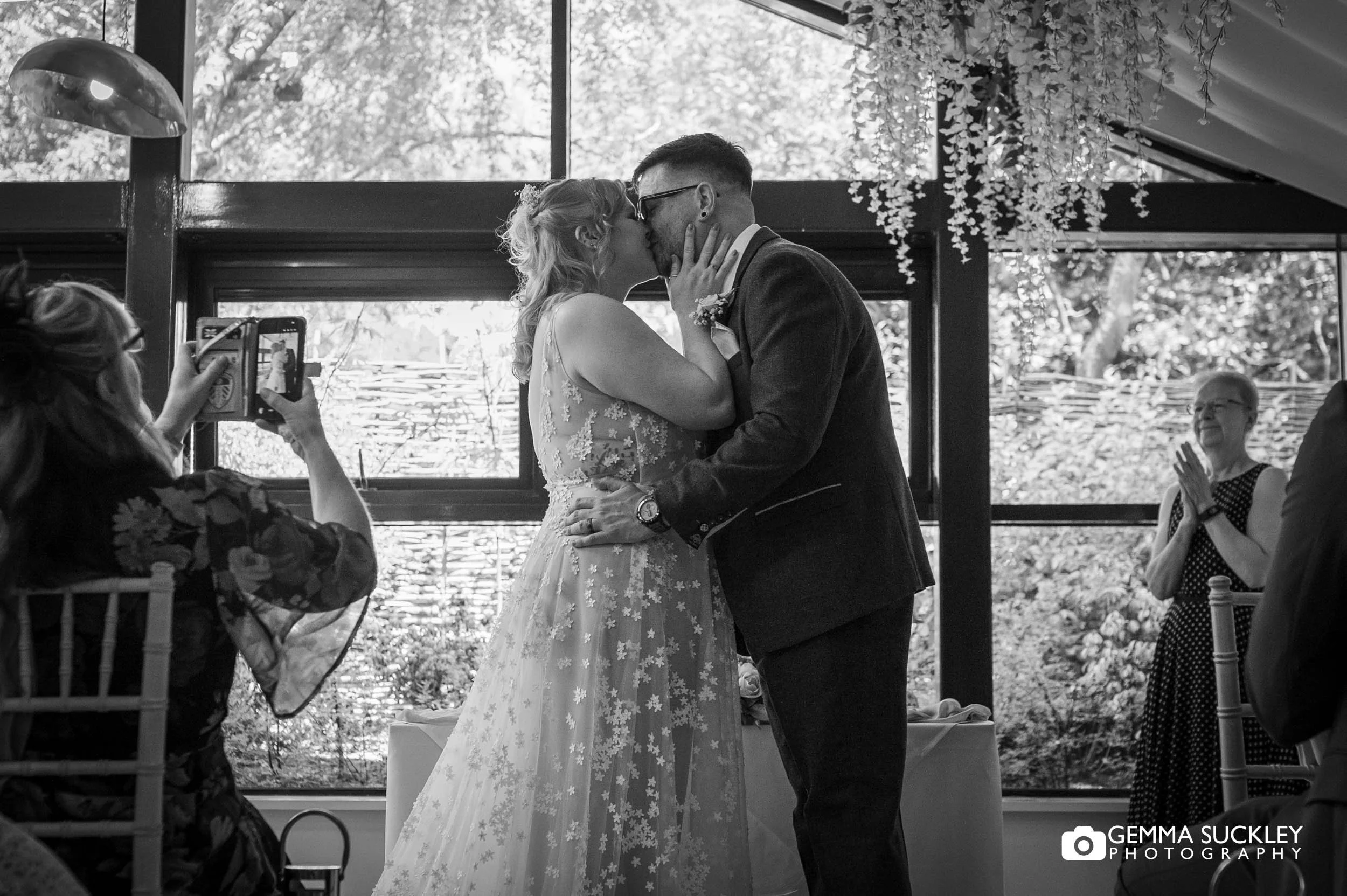 couples first kiss during the wedding ceremony