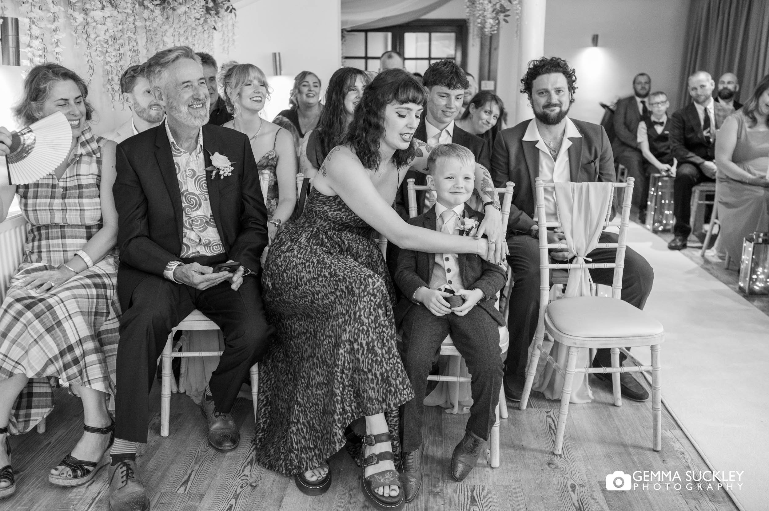 Guests watching the wedding ceremony