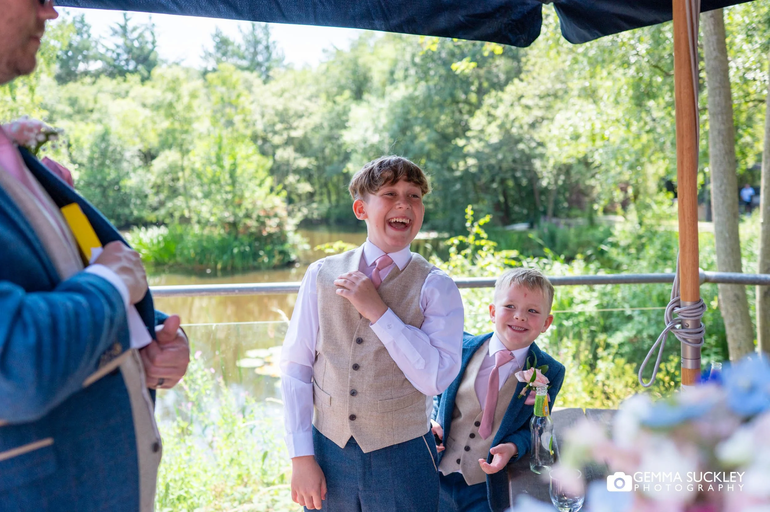 the couple sons laughing outside the chevin hotel 