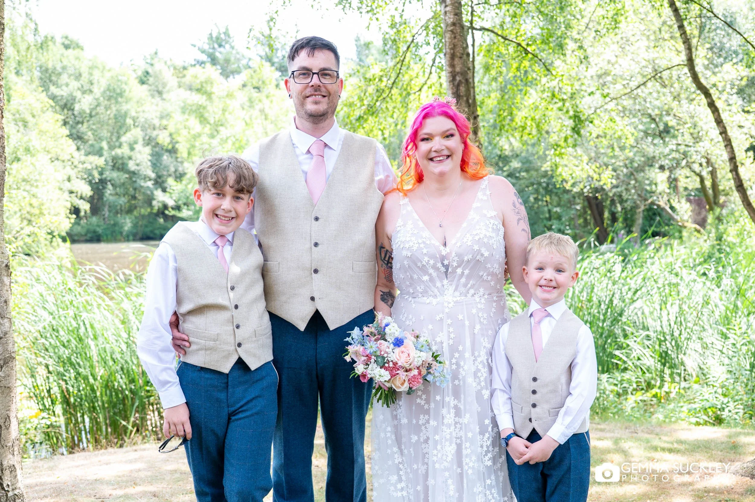 bride and groom with their kids