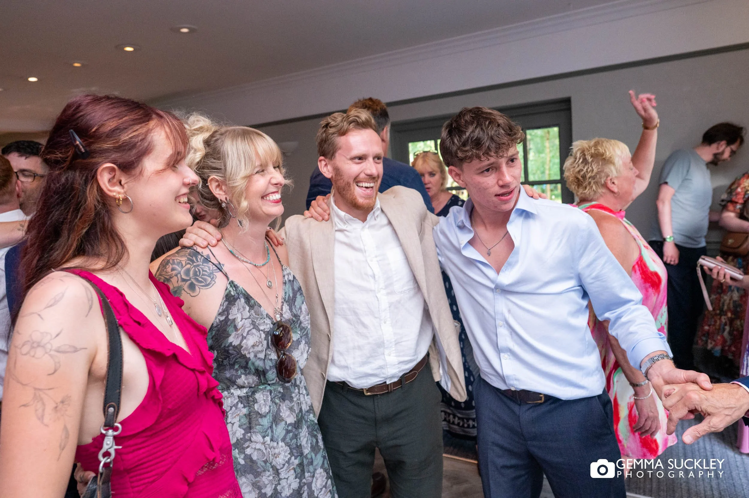 Guests dancing together during the evening reception