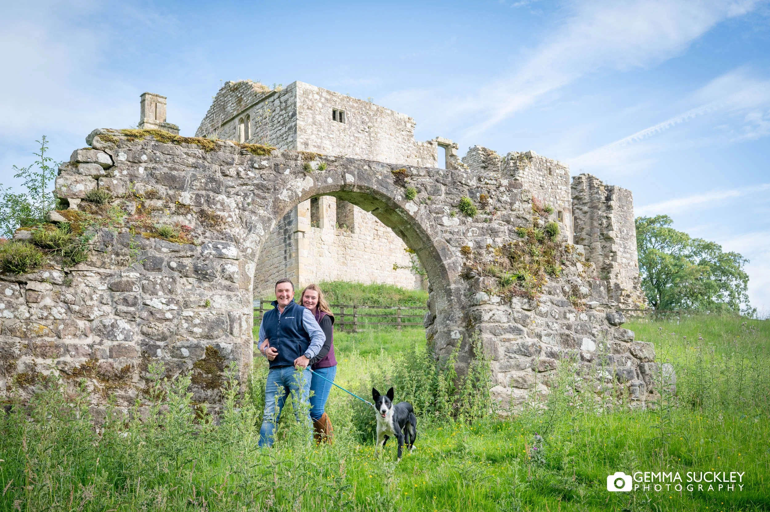 couple inside the arch in front of Barden tower