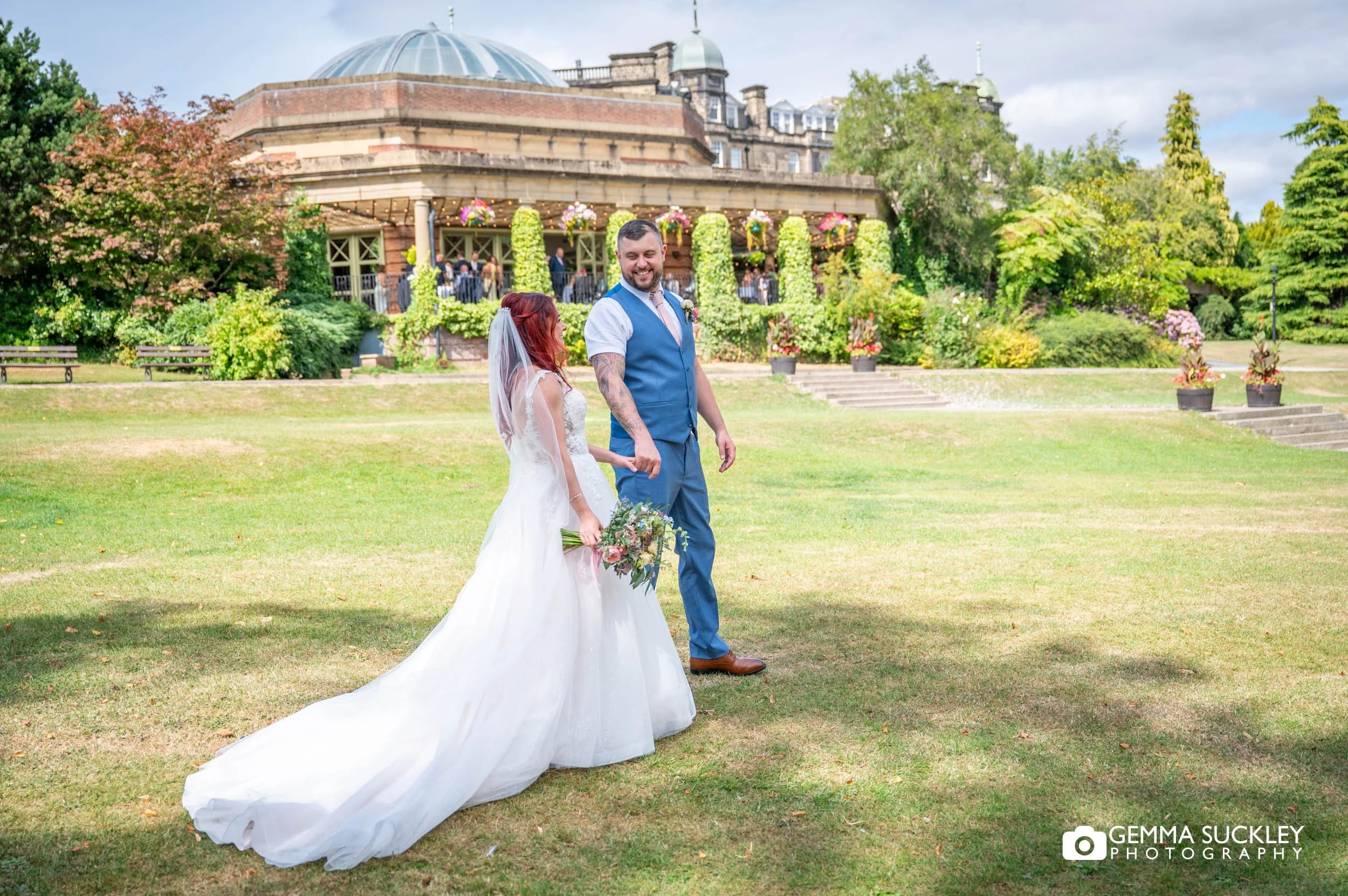 newly-weds in the valley Gardens with the The Sun Pavilion in the background