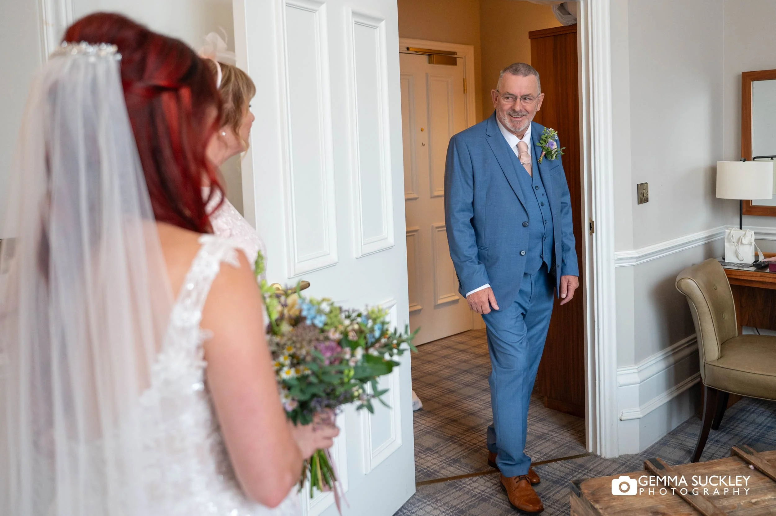 father of the bride reacting to seeing his daughter in the dress