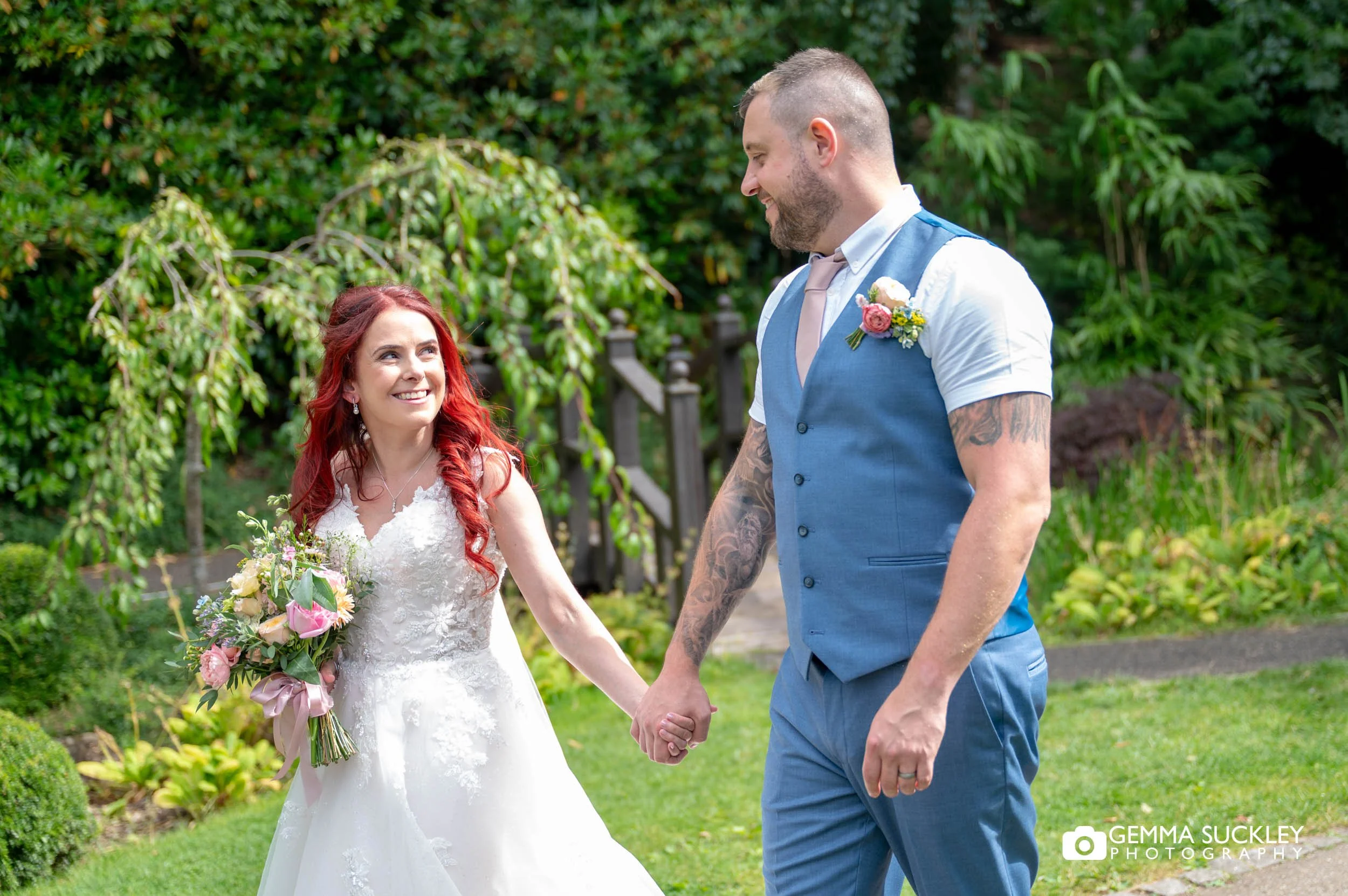 Relaxed wedding portrait of the newlyweds at The Sun Pavilion