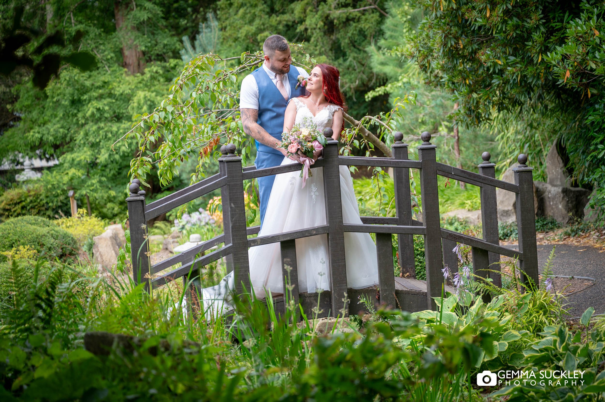 newlyweds in the japanese gardens at sun pavlion wedding