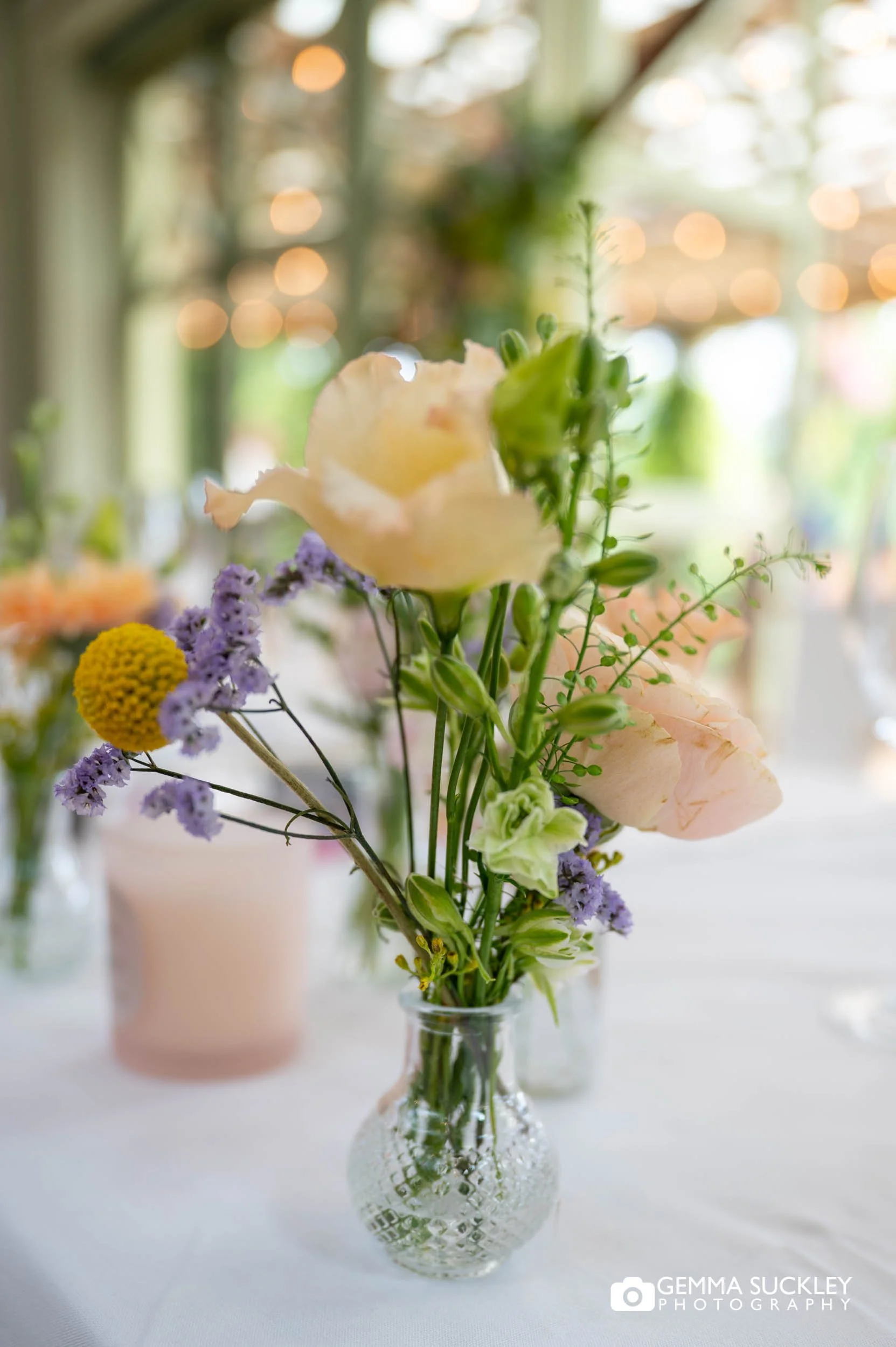 table flowers inside the sun pavilion