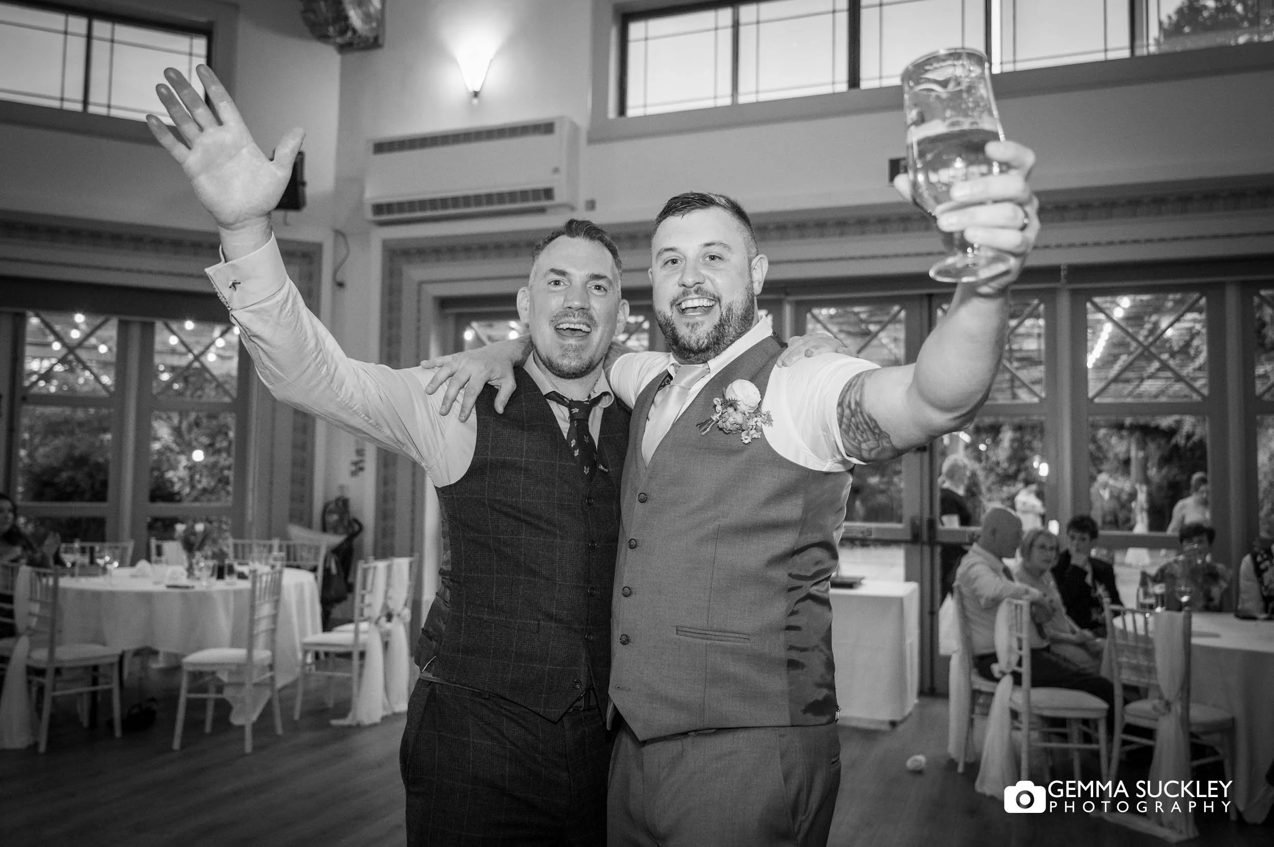 groom and guests posing for a photo