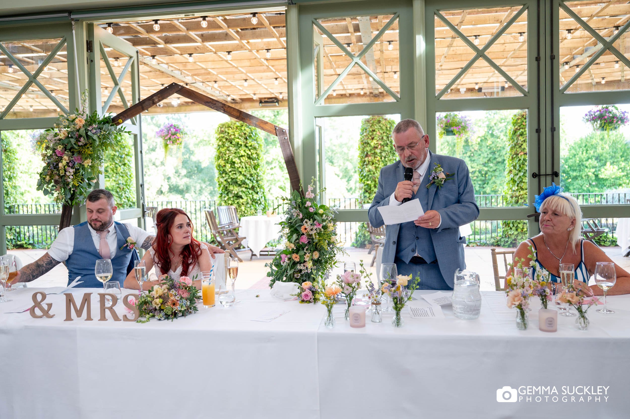 Bride's father giving a speech at the wedding