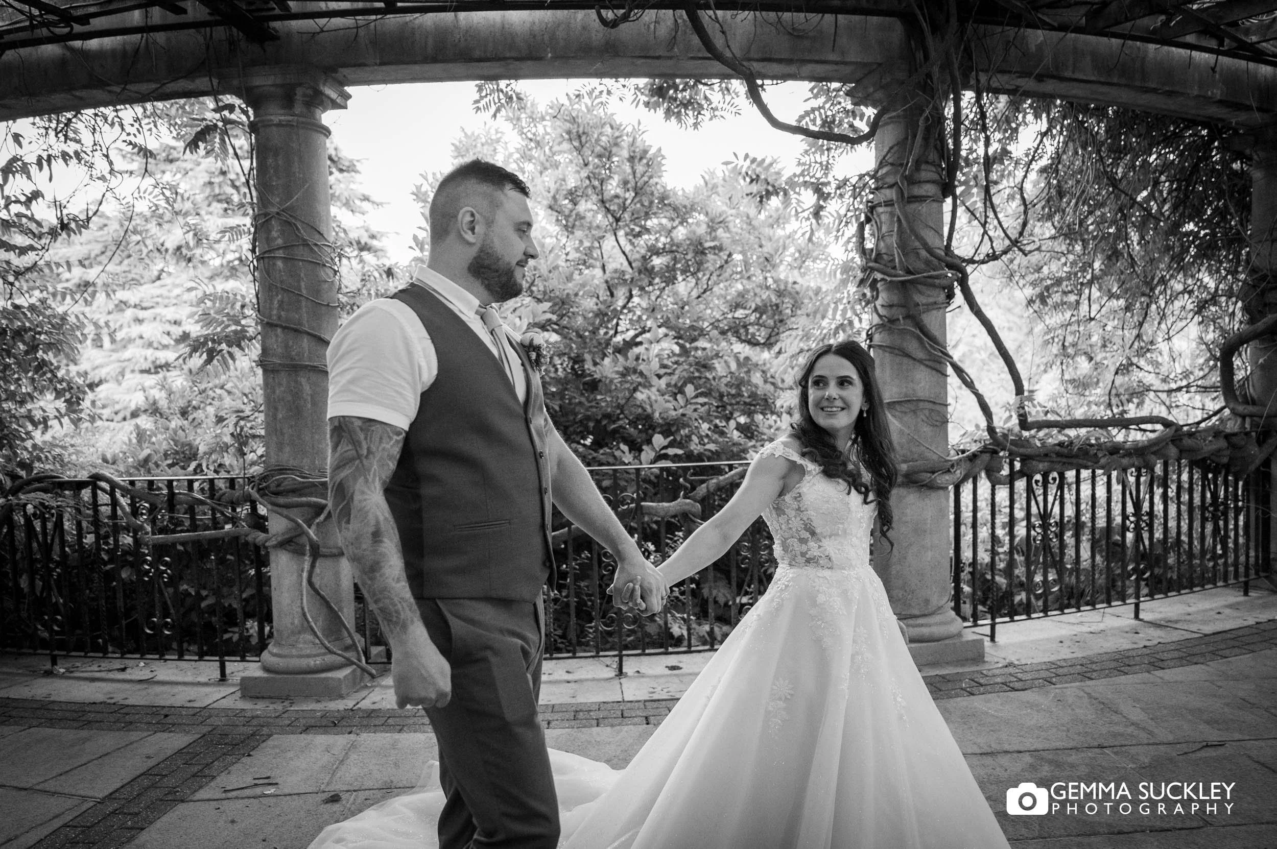 bride and groom outside the sun pavilion at the end of the night.